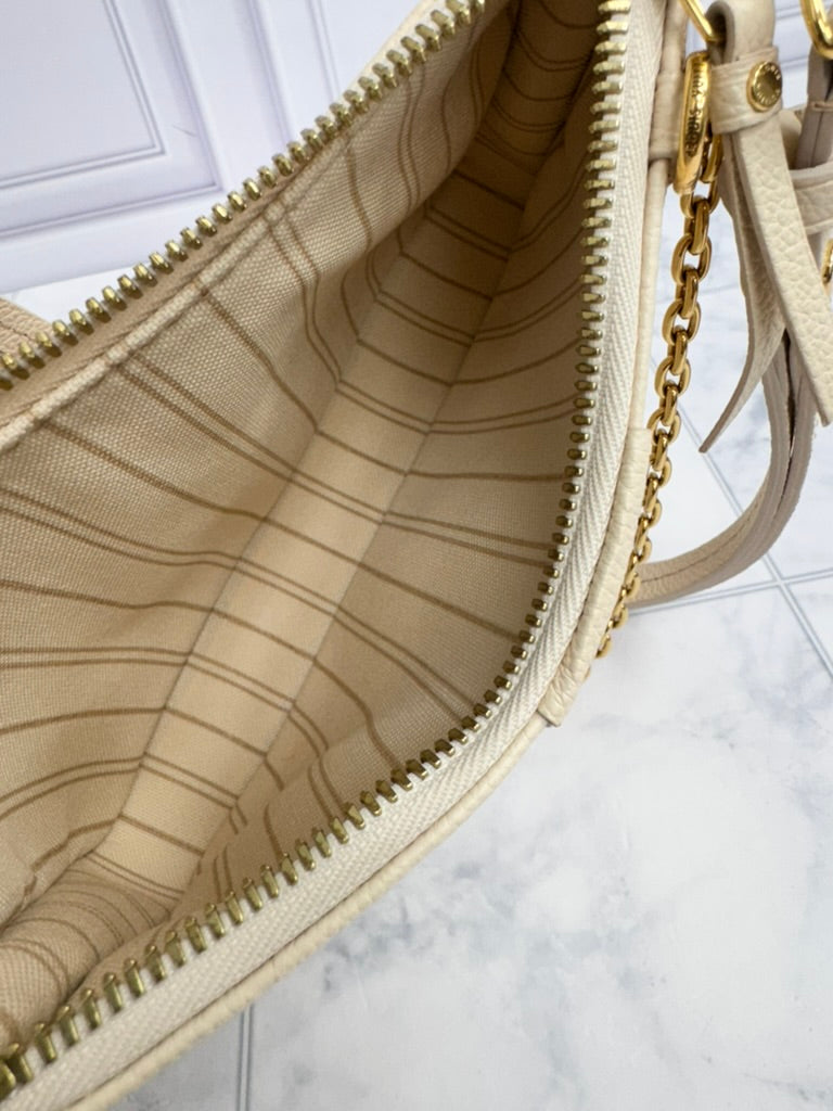 LIKE NEW - Louis Vuitton Creme Monogram Empreinte Easy Pouch On Strap