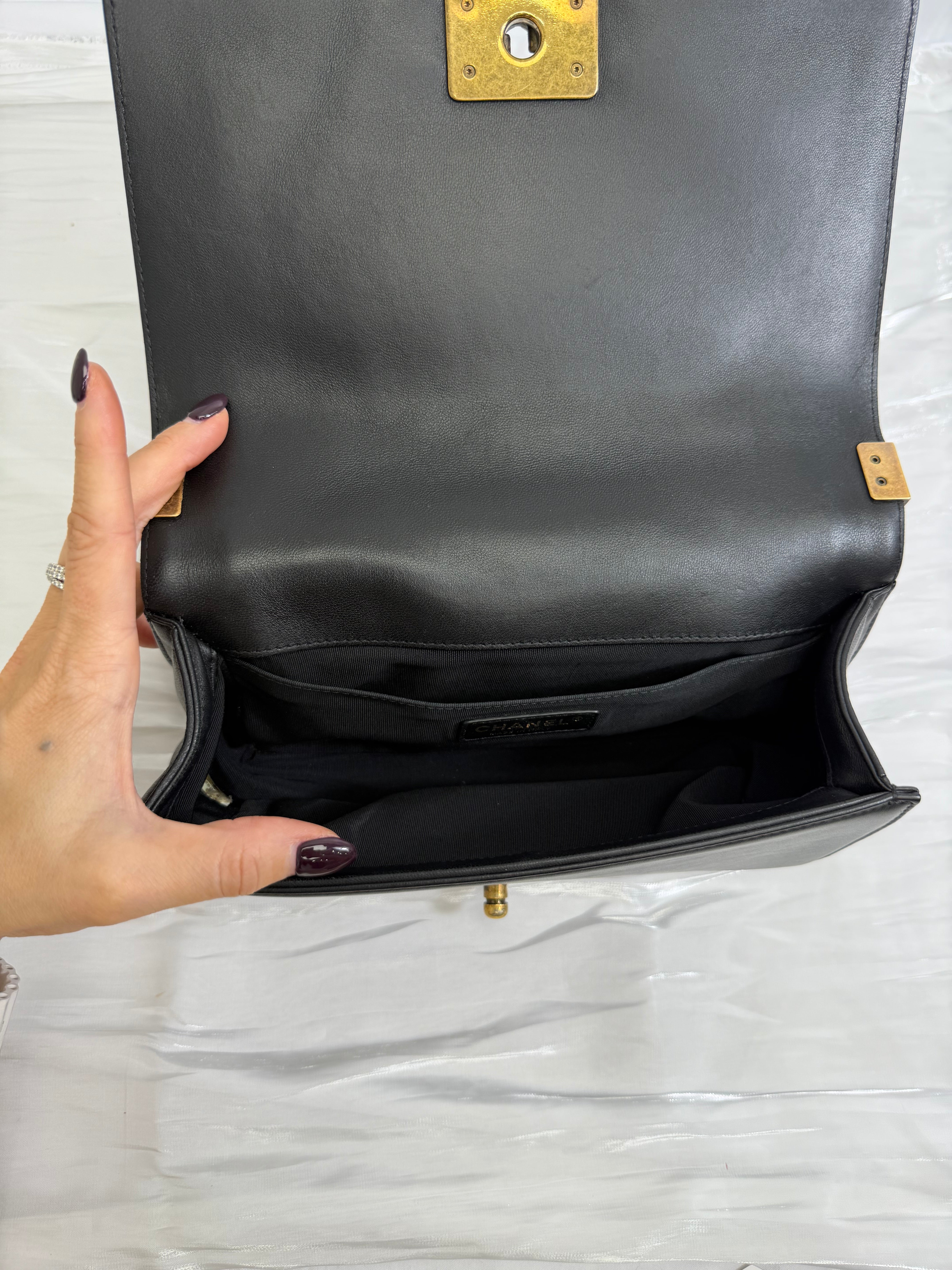 Chanel Quilted Calfskin Crest Embellished Medium Boy Bag