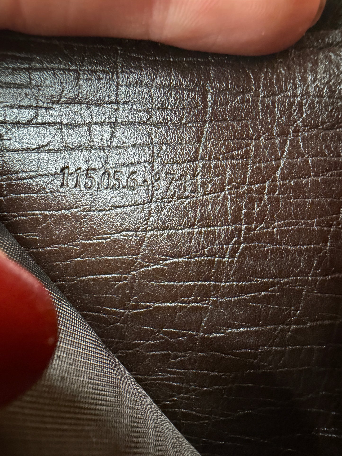Gucci GG Coated Canvas Zippy Wallet