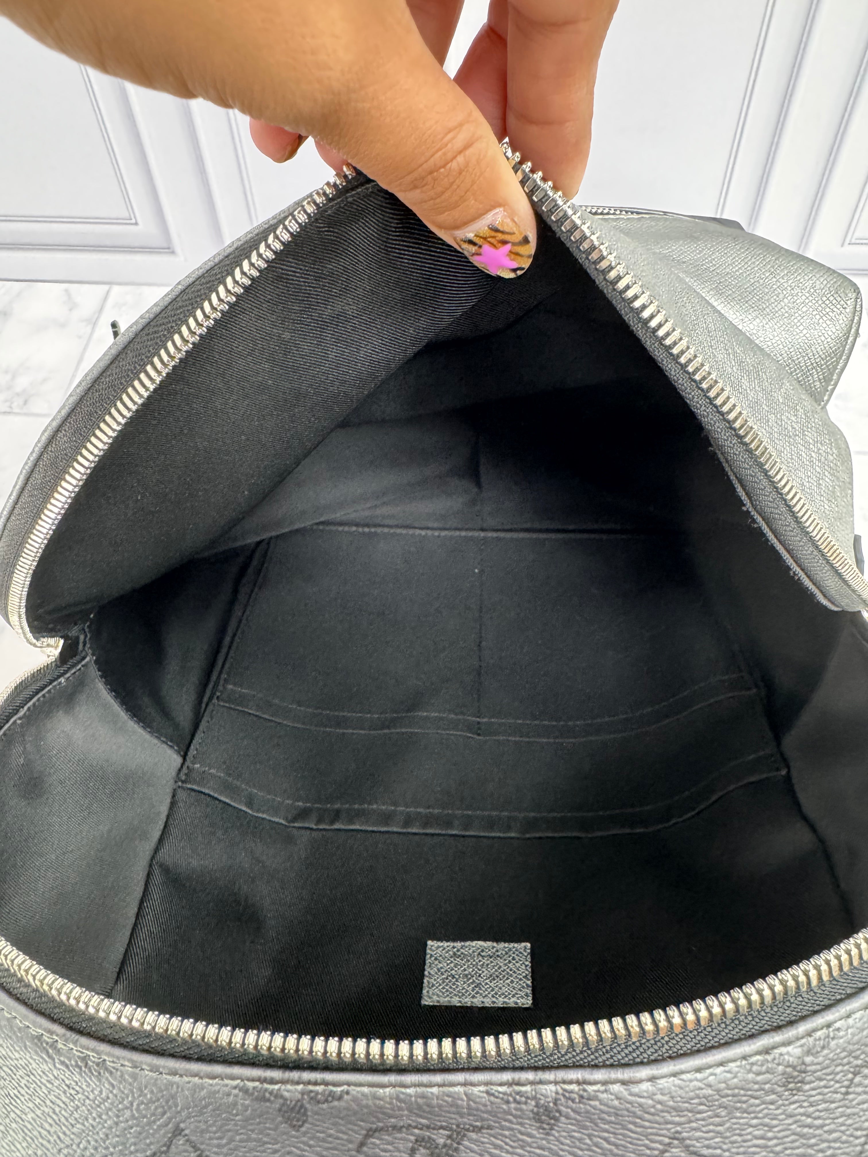Louis Vuitton Metallic Silver Monogram Taigarama Discovery Backpack PM