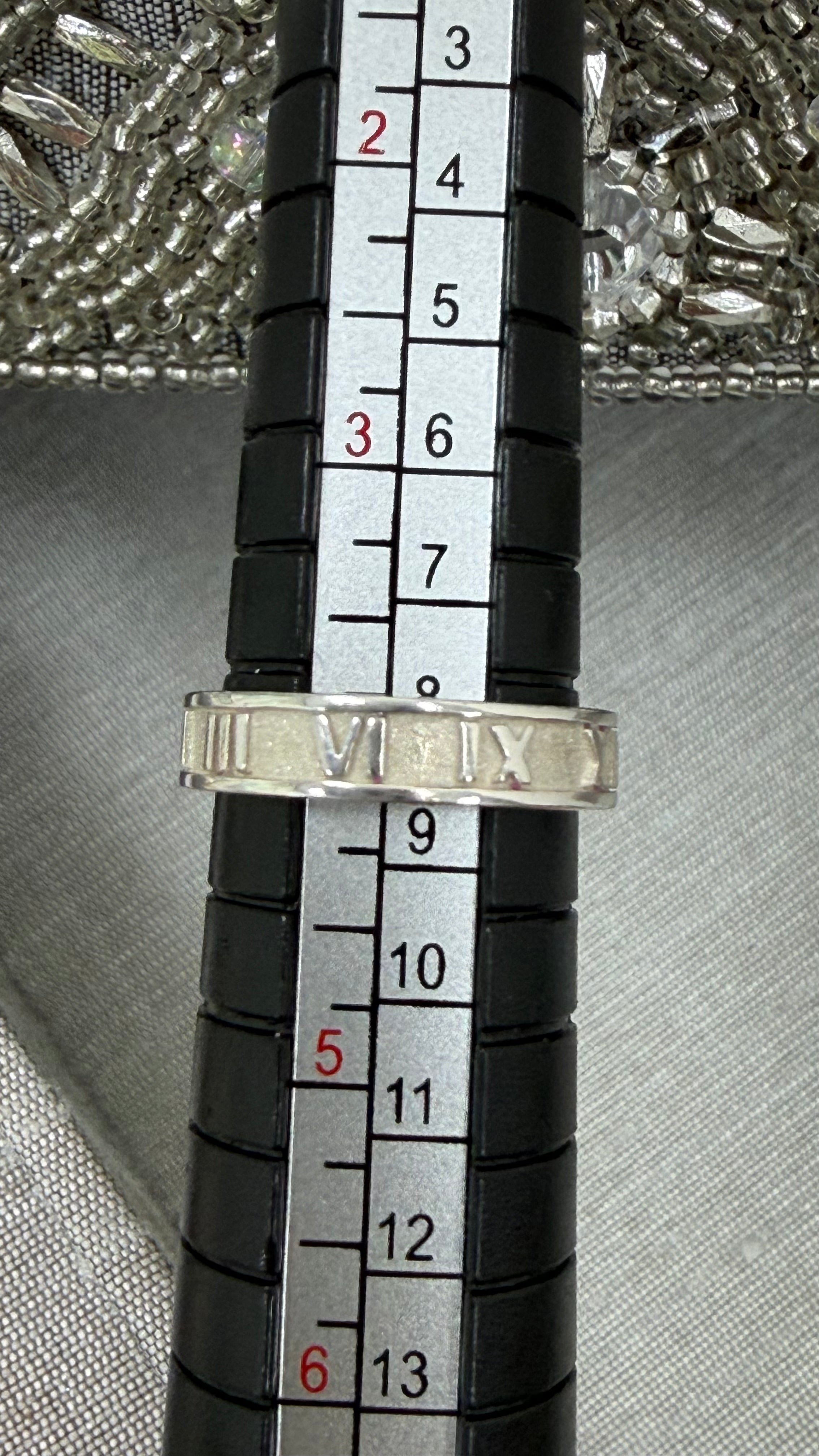 Tiffany & Co Sterling Silver Atlas Roman Numeral Ring Size 4