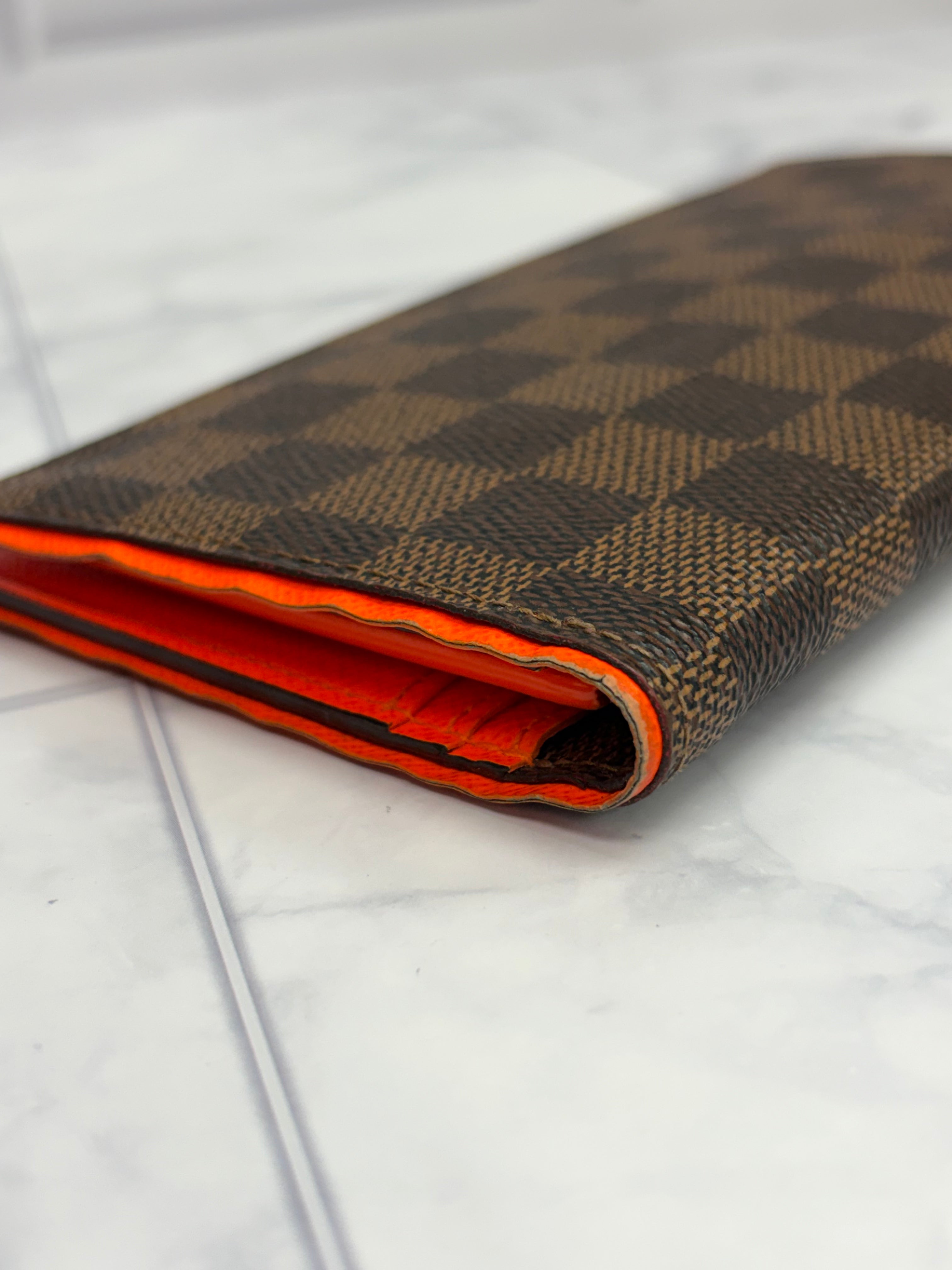 Louis Vuitton Damier Ebene & Neon Orange Brazza Wallet