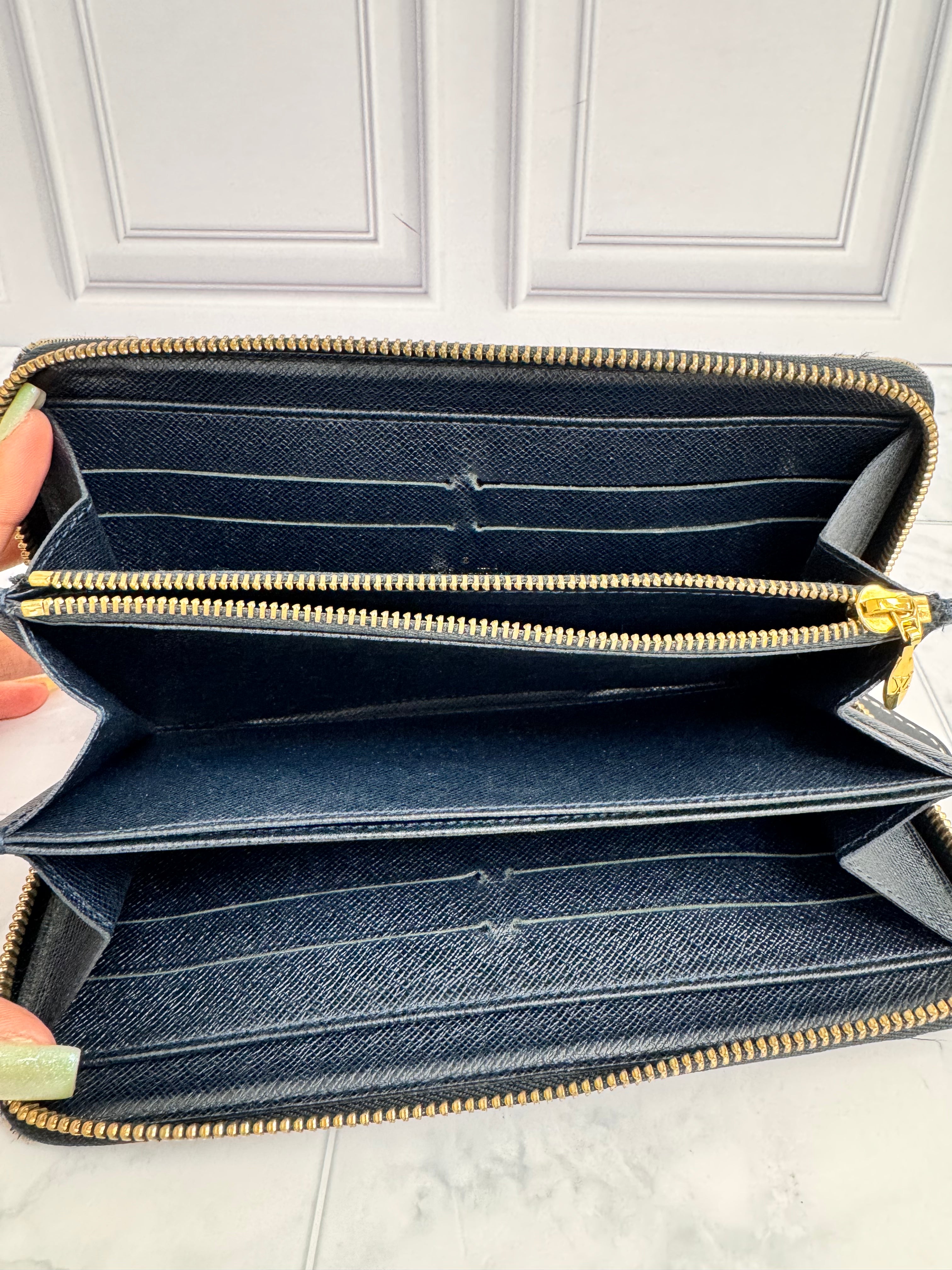 Louis Vuitton Mini Lin Monogram Zippy Wallet