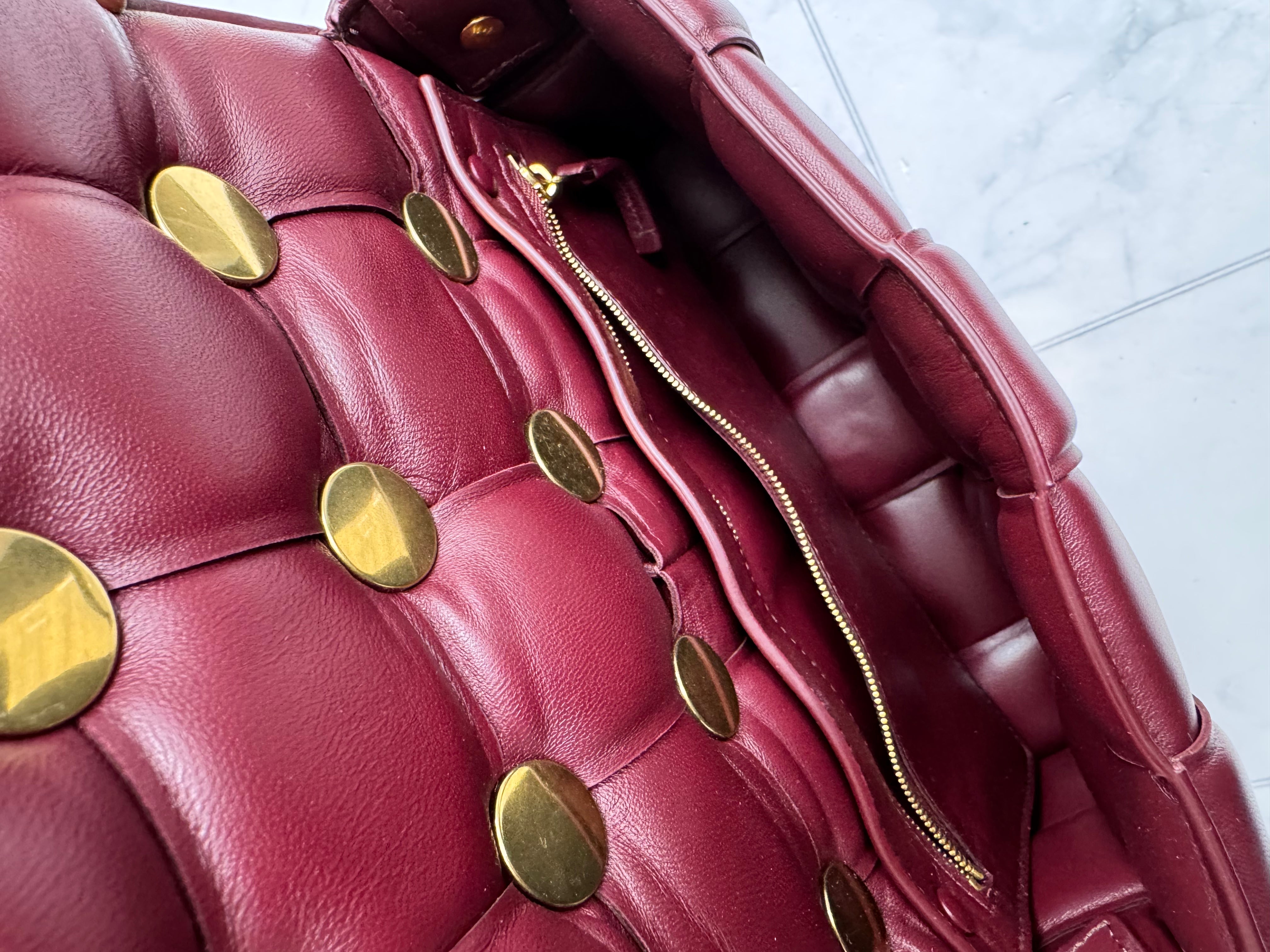 Bottega Veneta Burgundy Padded Maxi Intrecciato Leather Studded Cassette Crossbody Bag