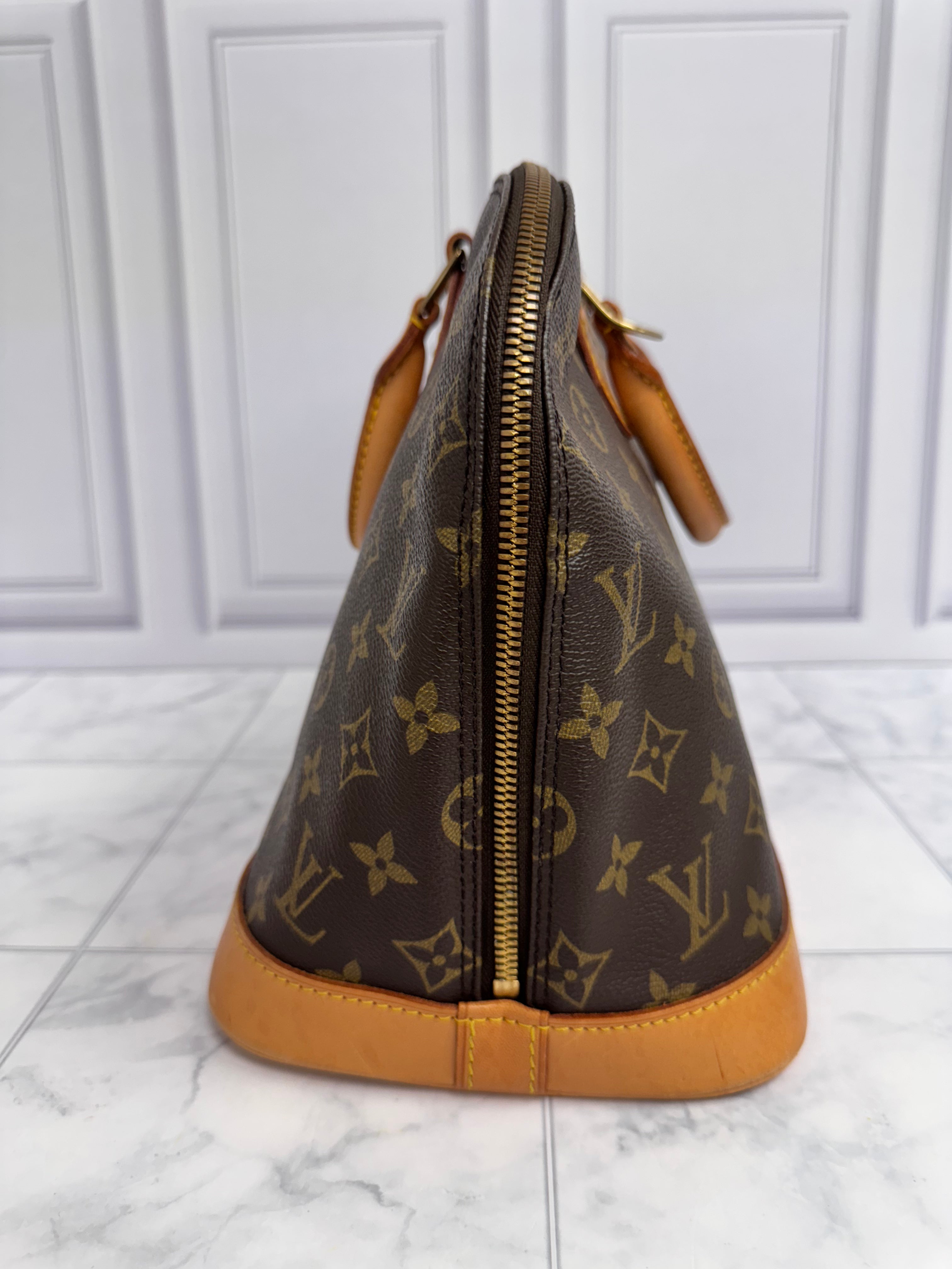 Louis Vuitton Monogram Alma PM Handbag