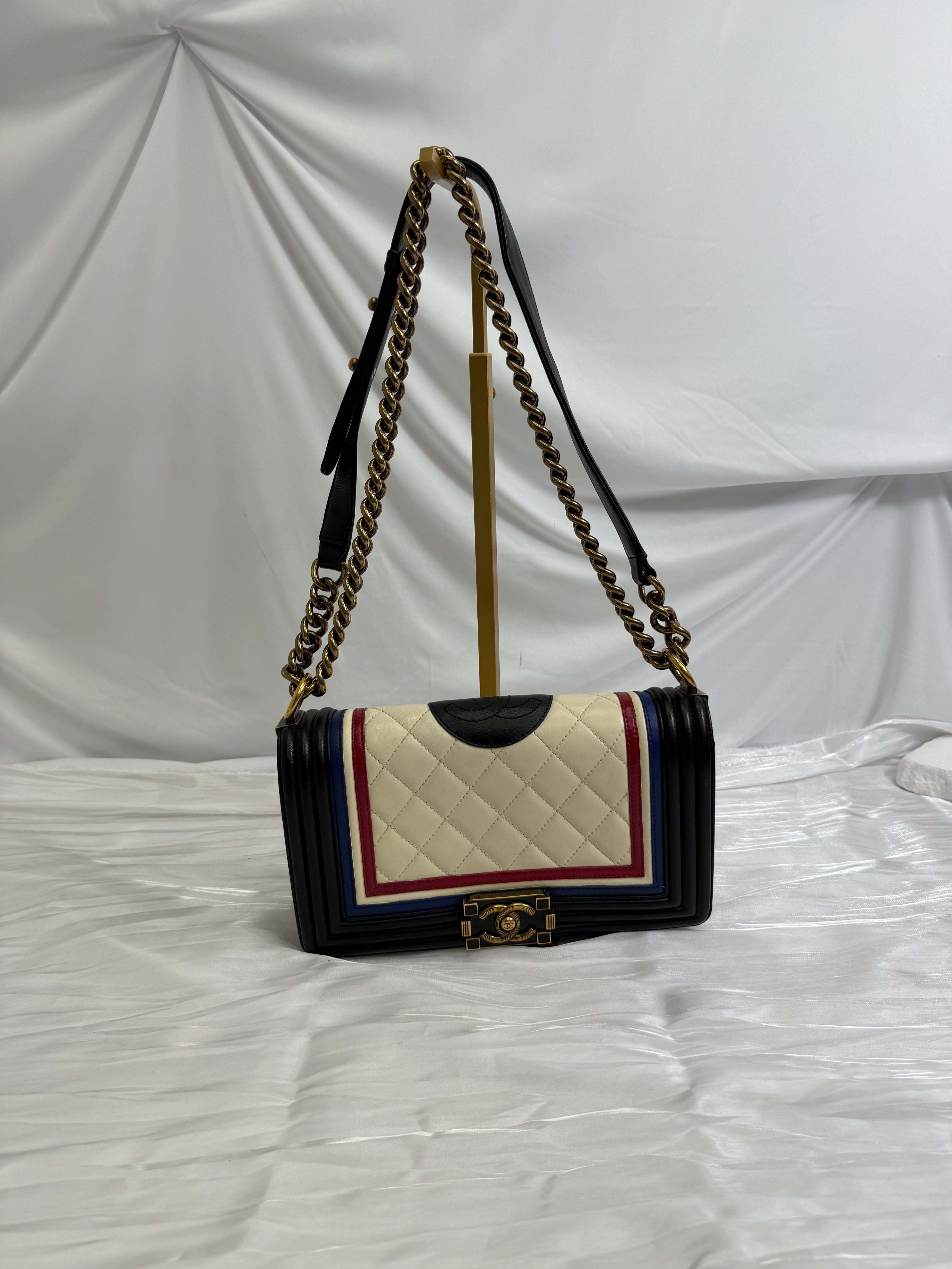 Chanel Quilted Calfskin Crest Embellished Medium Boy Bag