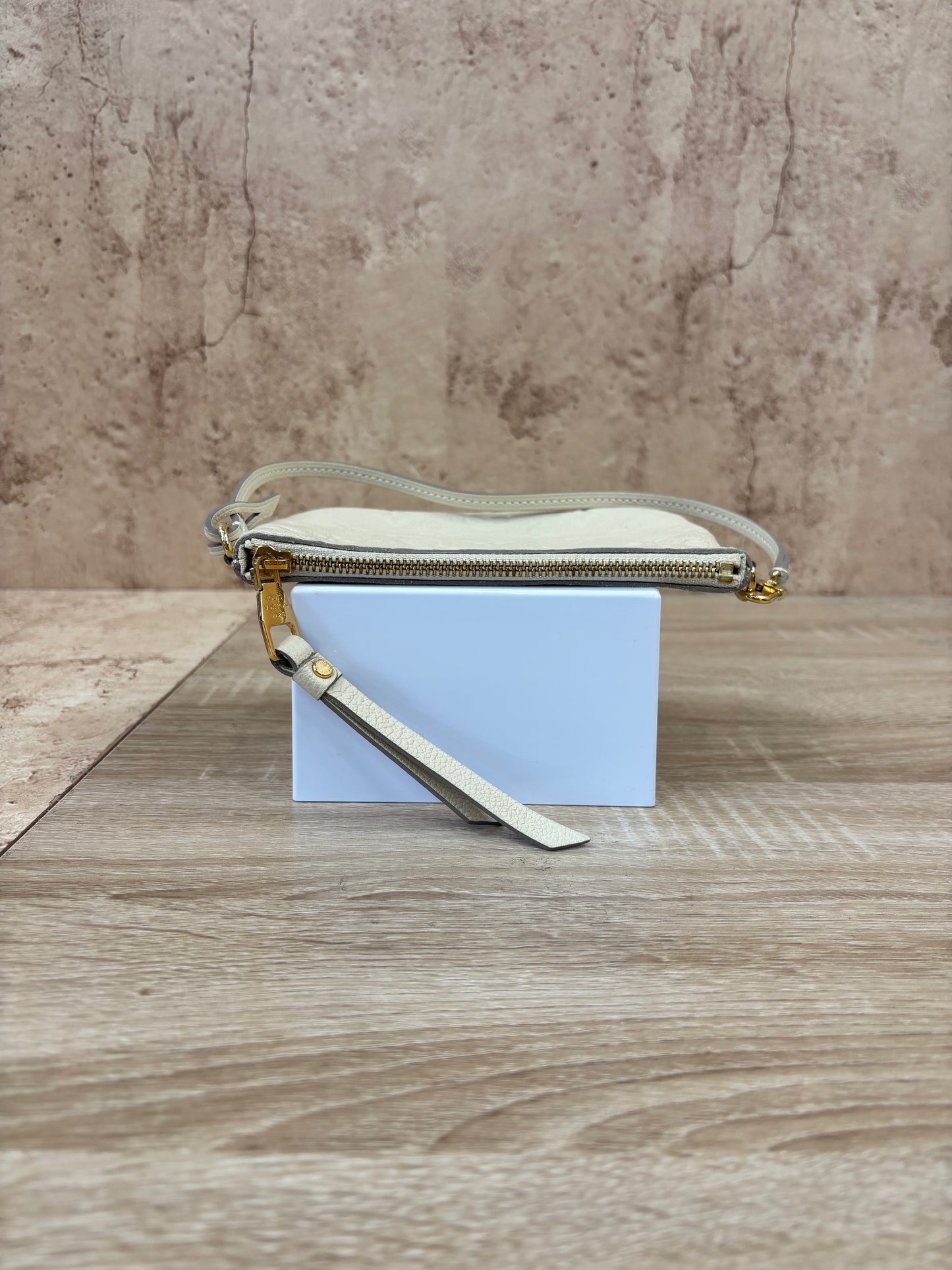 Louis Vuitton Cream Empreinte Leather Pochette