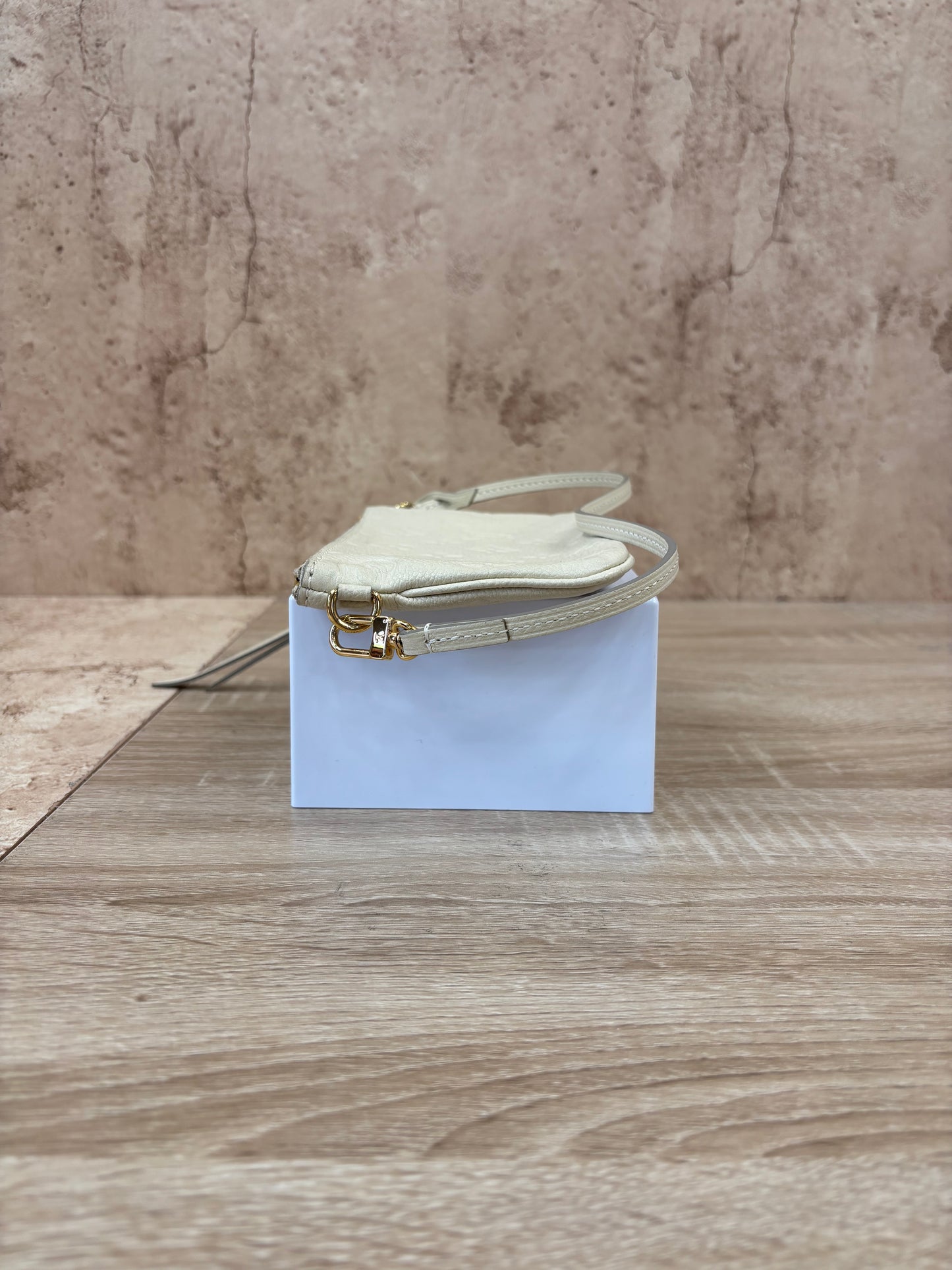 Louis Vuitton Cream Empreinte Leather Pochette
