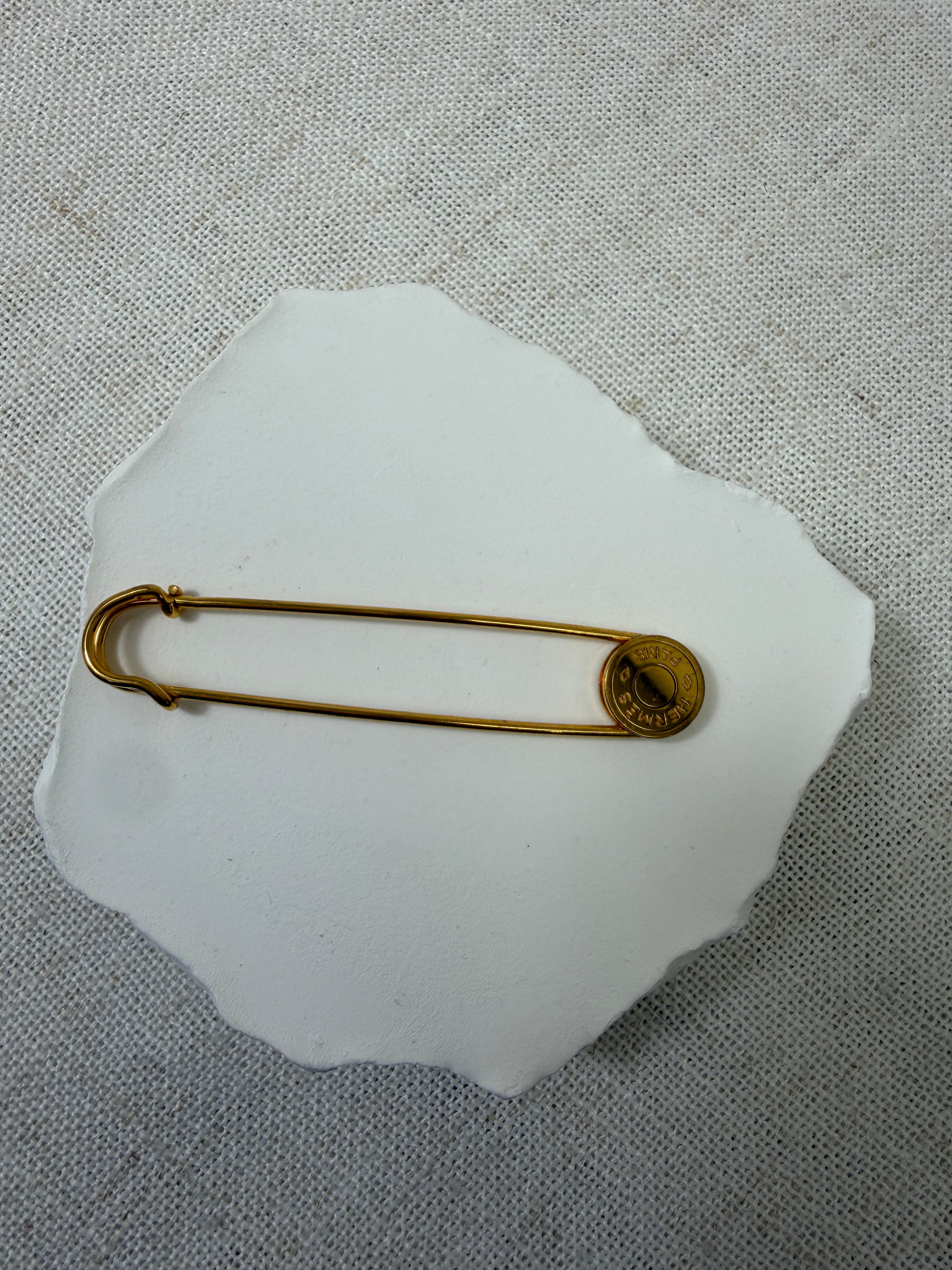 Hermes Gold Tone Clou de Selle Safety Pin Brooch