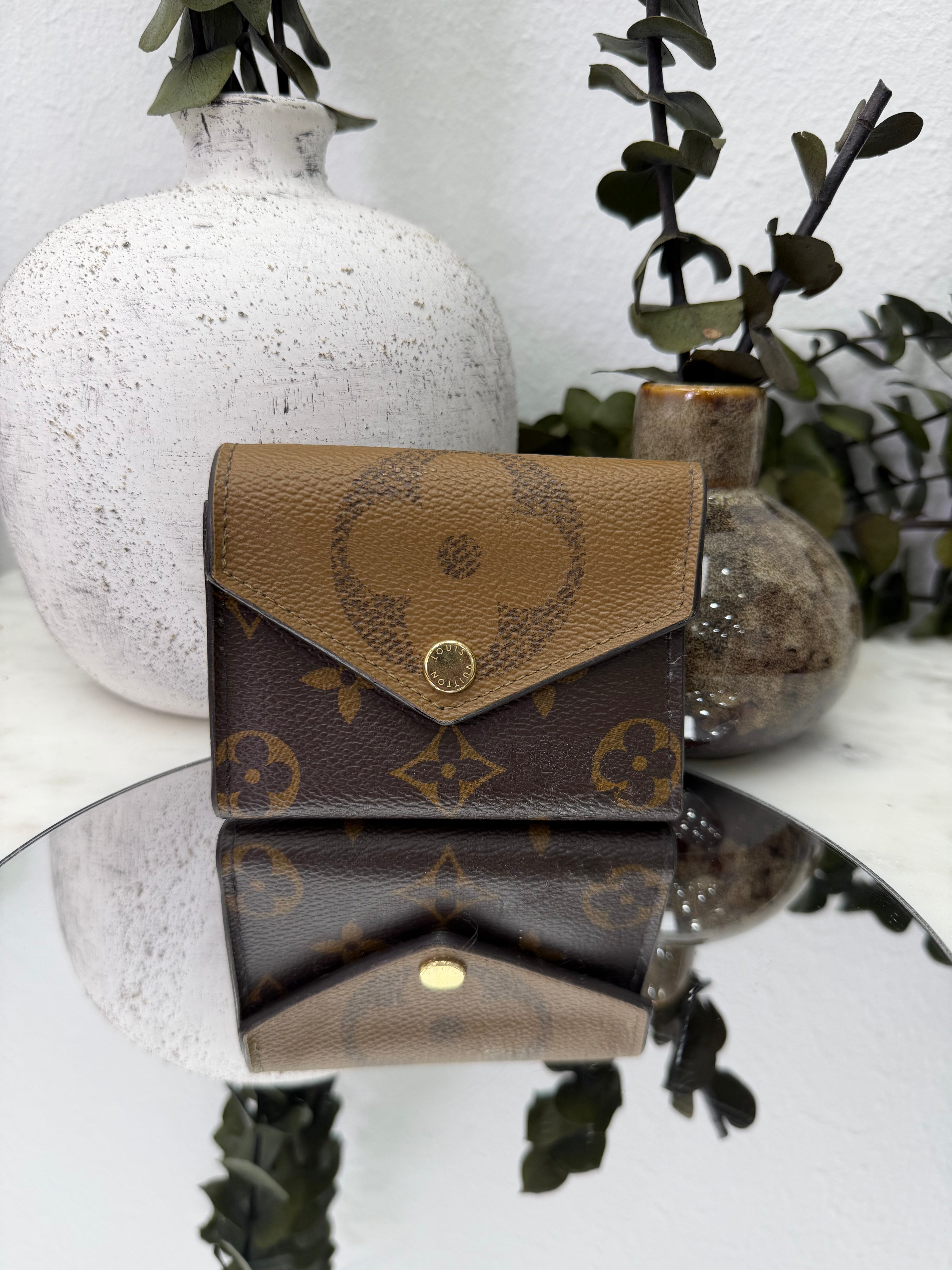 Louis Vuitton Reverse Monogram Zoe Compact Wallet