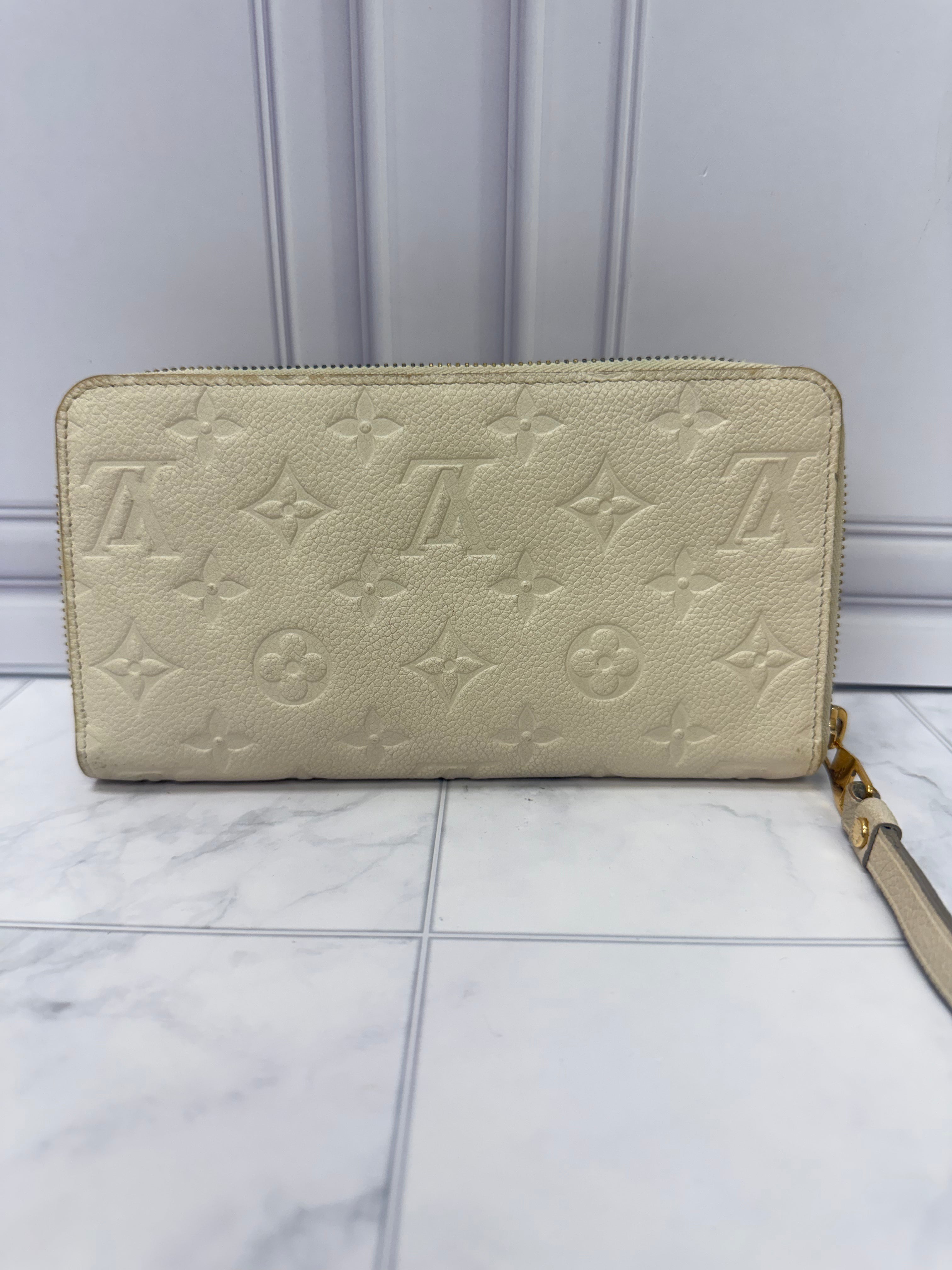 Louis Vuitton Cream Monogram Empreinte Leather Zippy Wallet