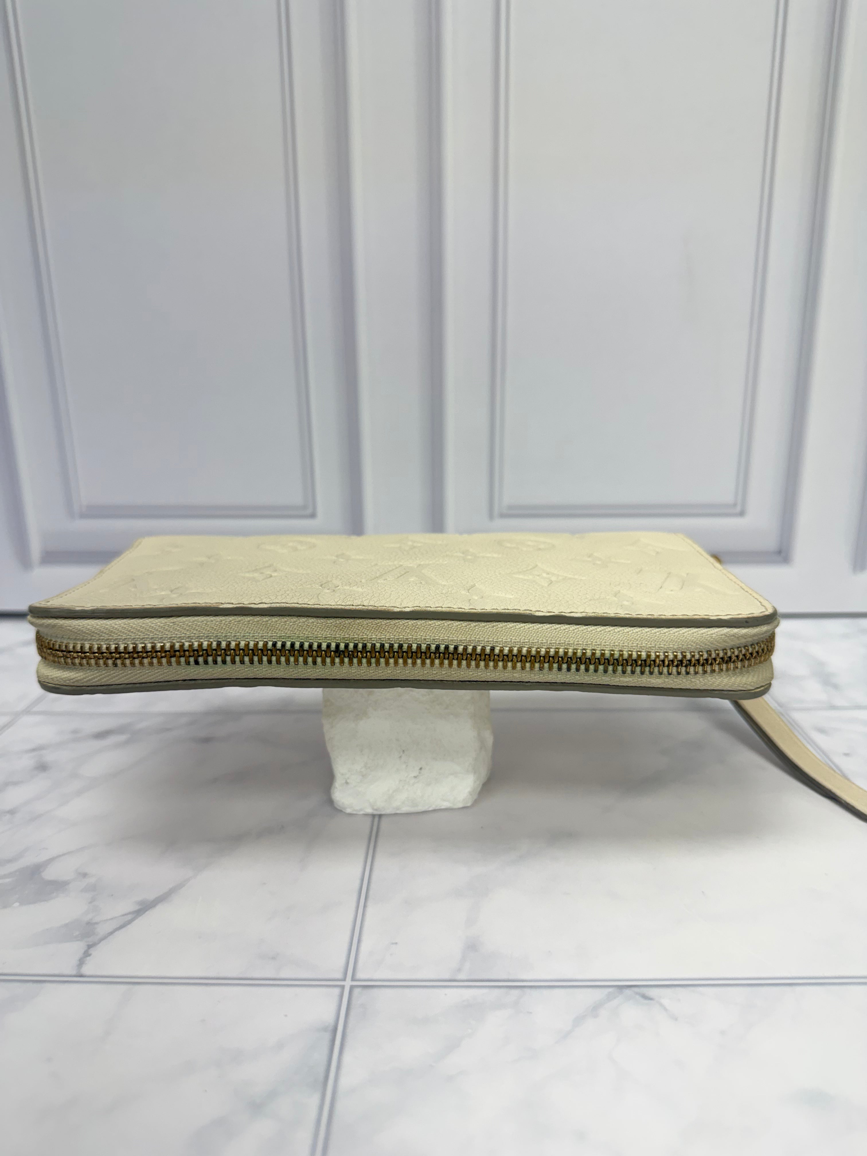 Louis Vuitton Cream Monogram Empreinte Leather Zippy Wallet
