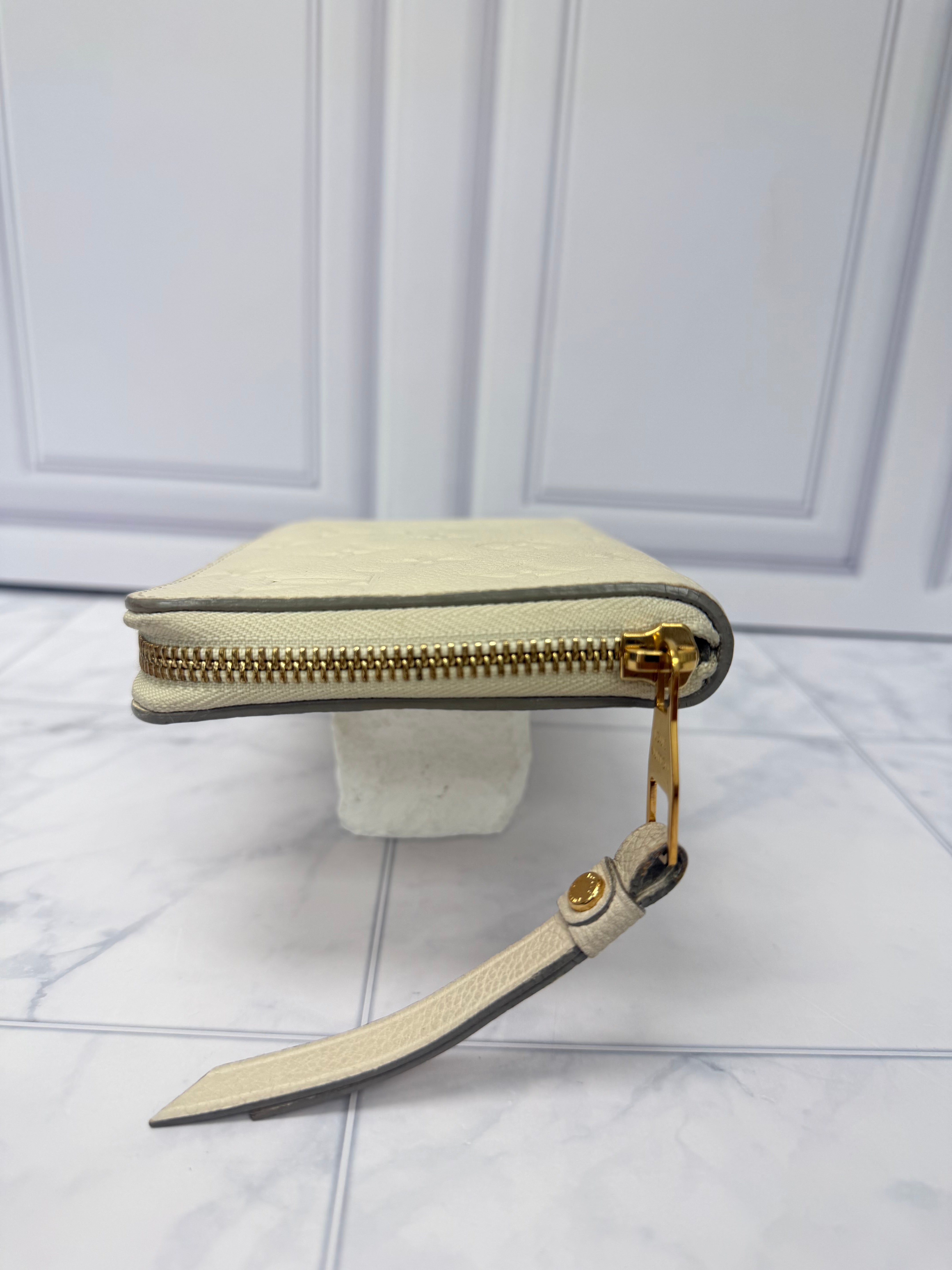 Louis Vuitton Cream Monogram Empreinte Leather Zippy Wallet