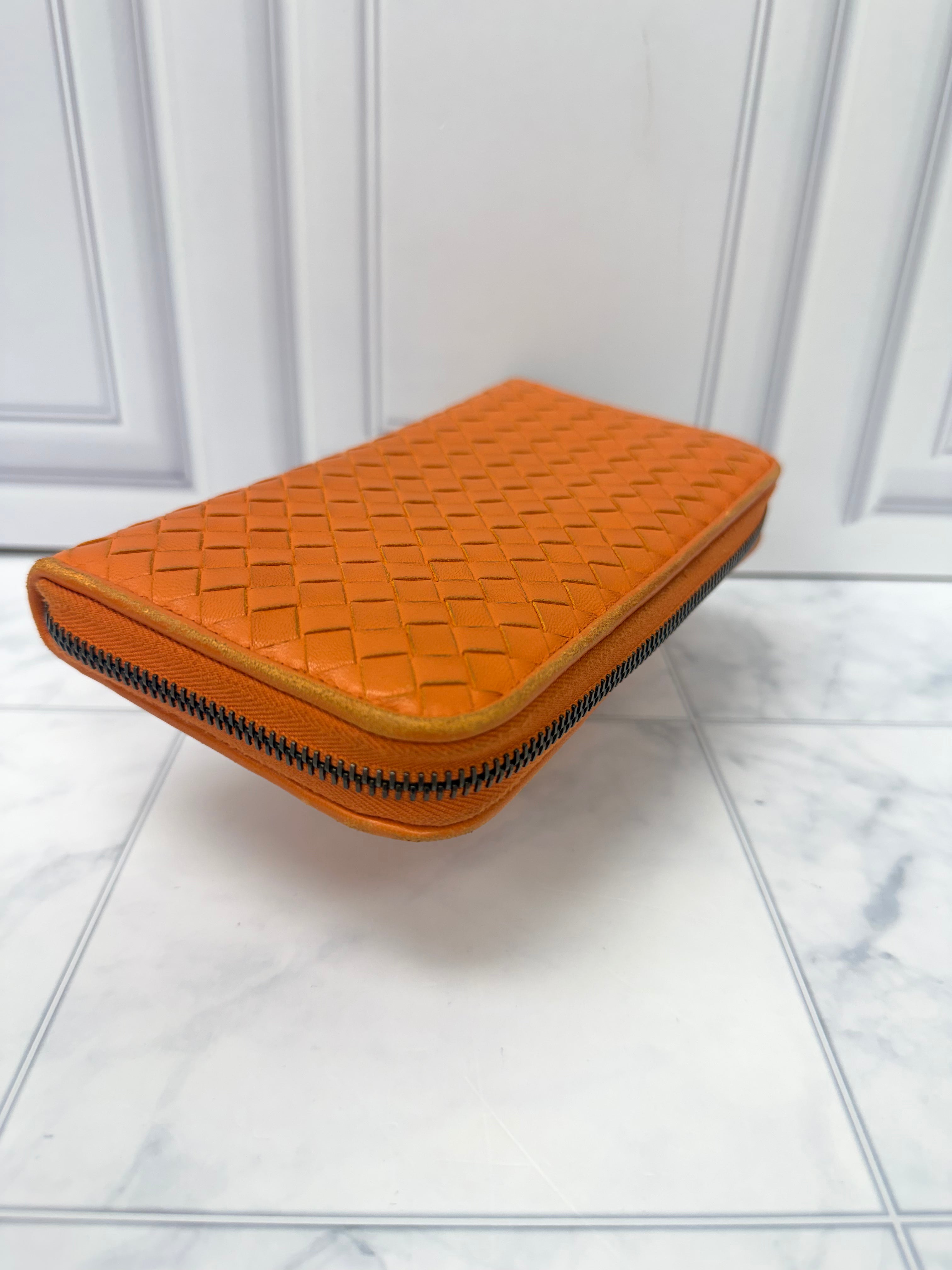 Bottega Veneta Orange Intrecciato leather Zippy Wallet