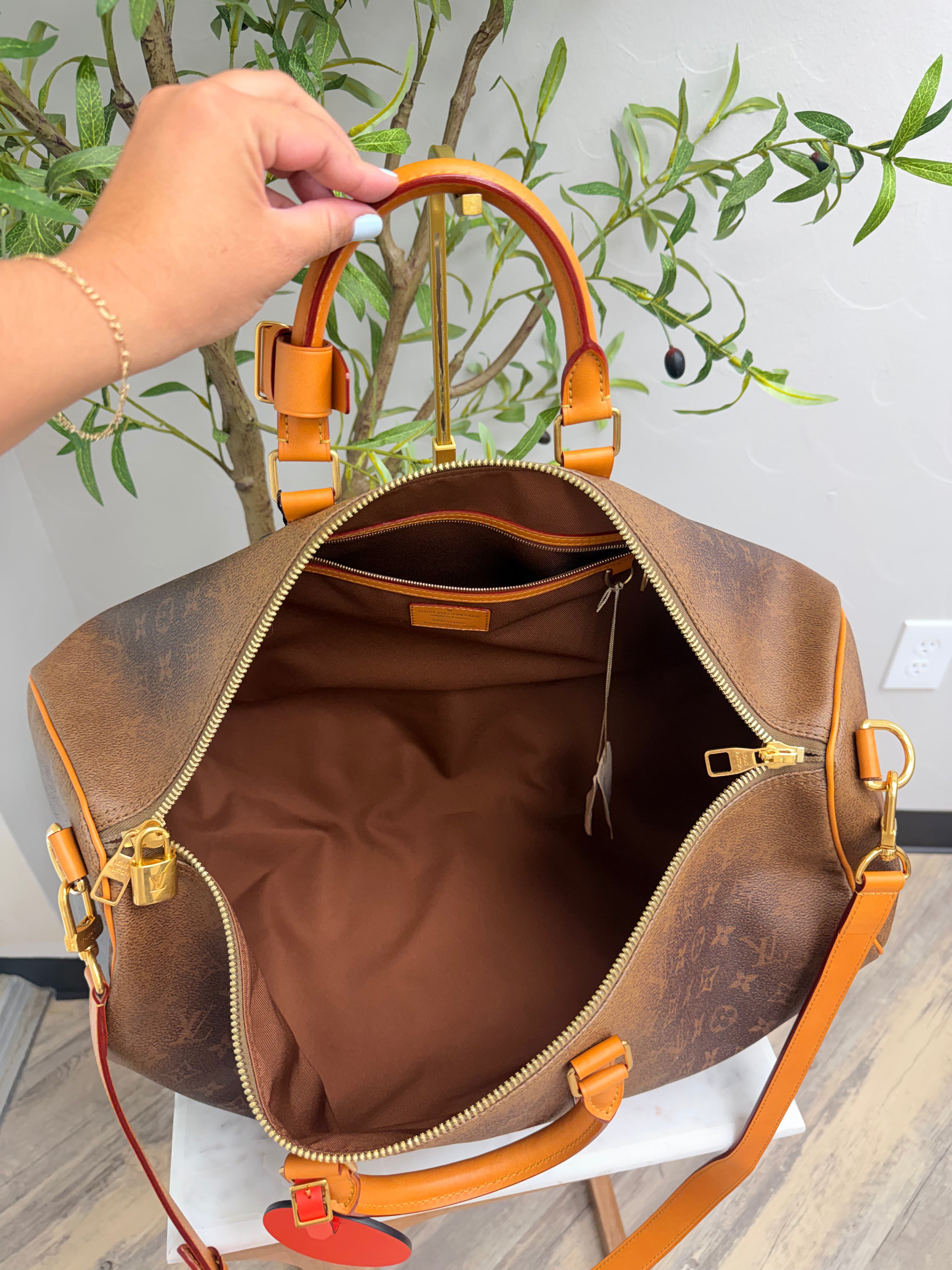 BRAND NEW - Louis Vuitton Monogram Dust Keepall Bandouliere 50