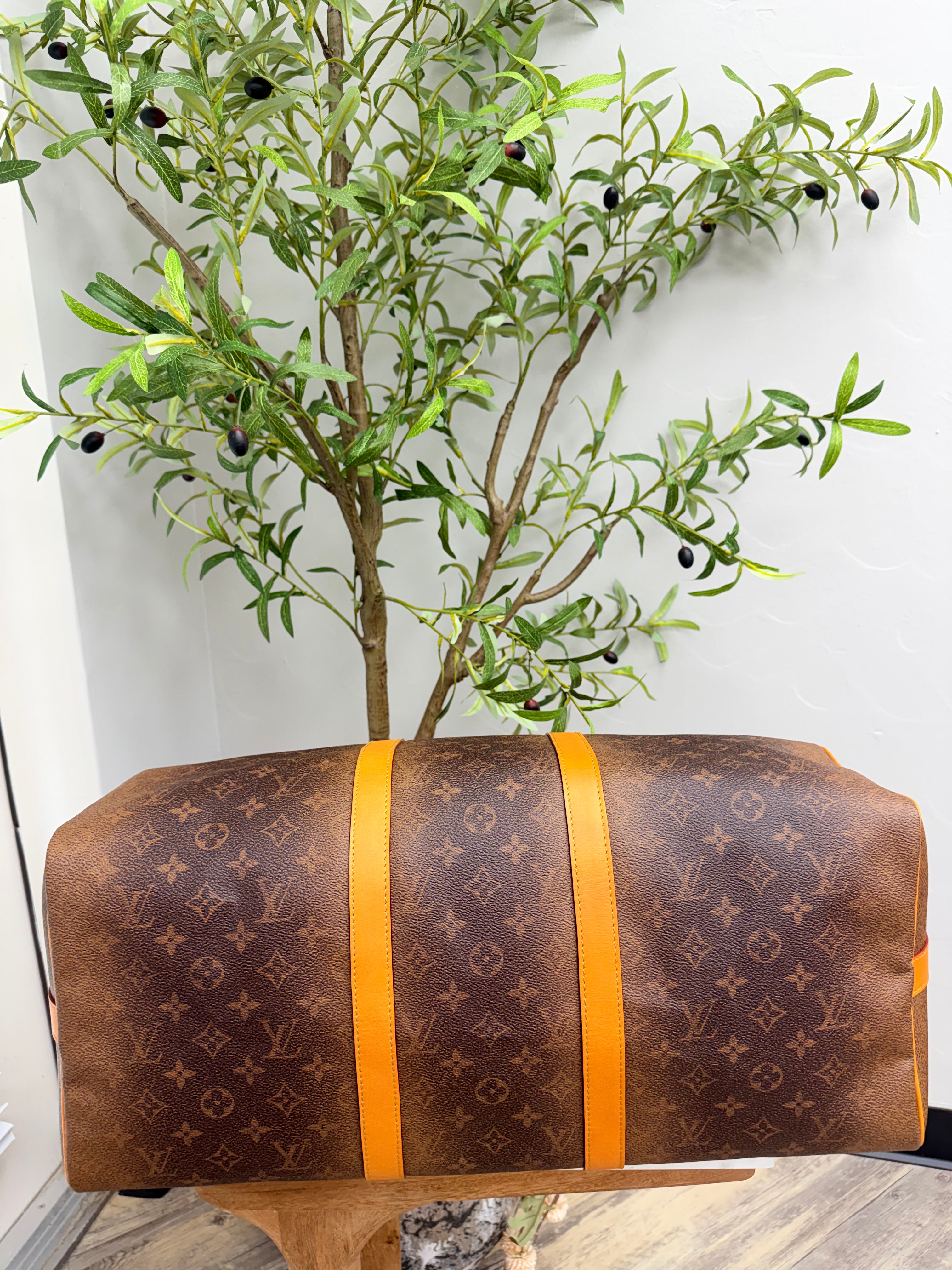 BRAND NEW - Louis Vuitton Monogram Dust Keepall Bandouliere 50