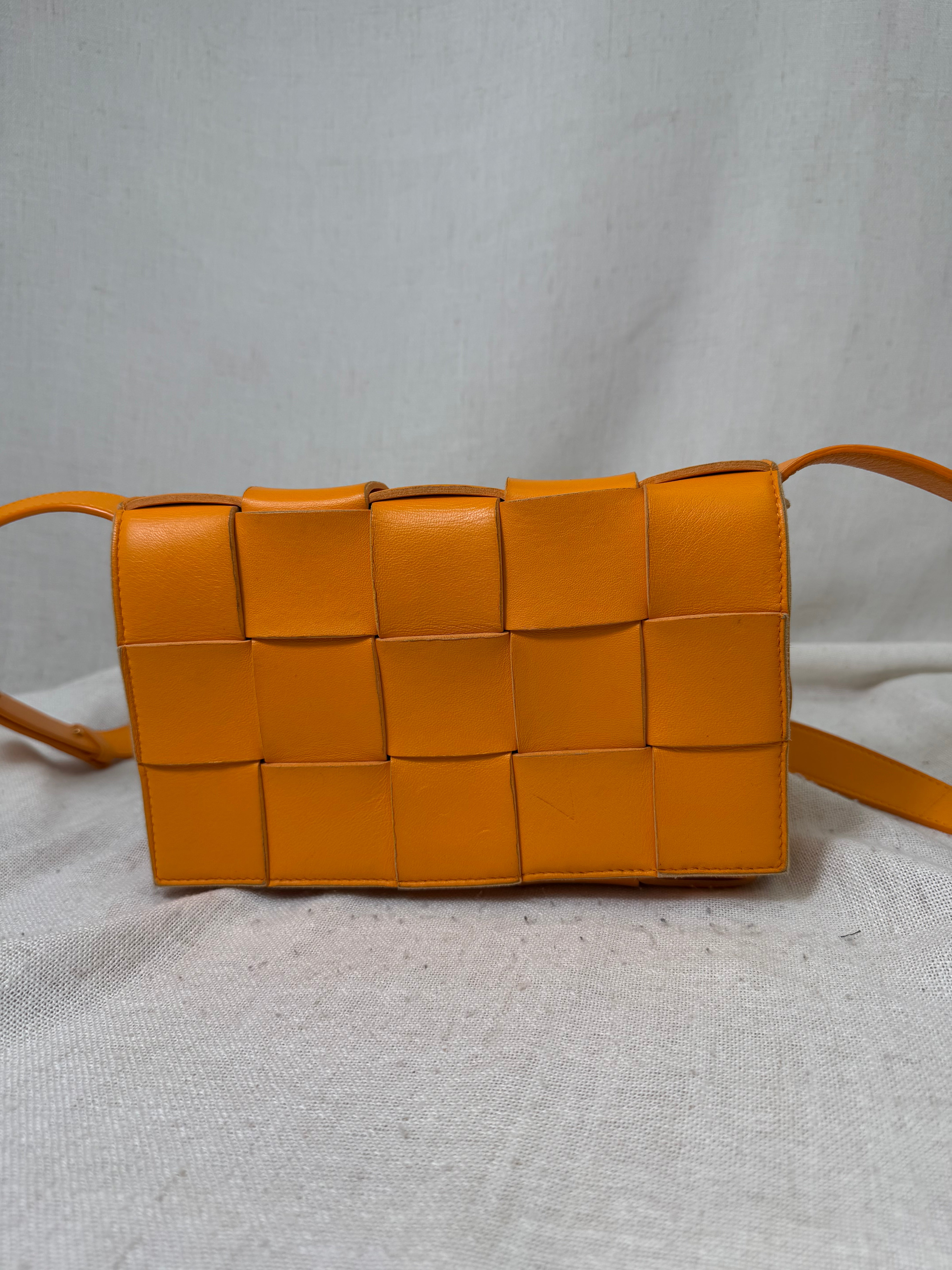 Bottega Veneta Orange Intrecciato Leather Cassette Crossbody Bag