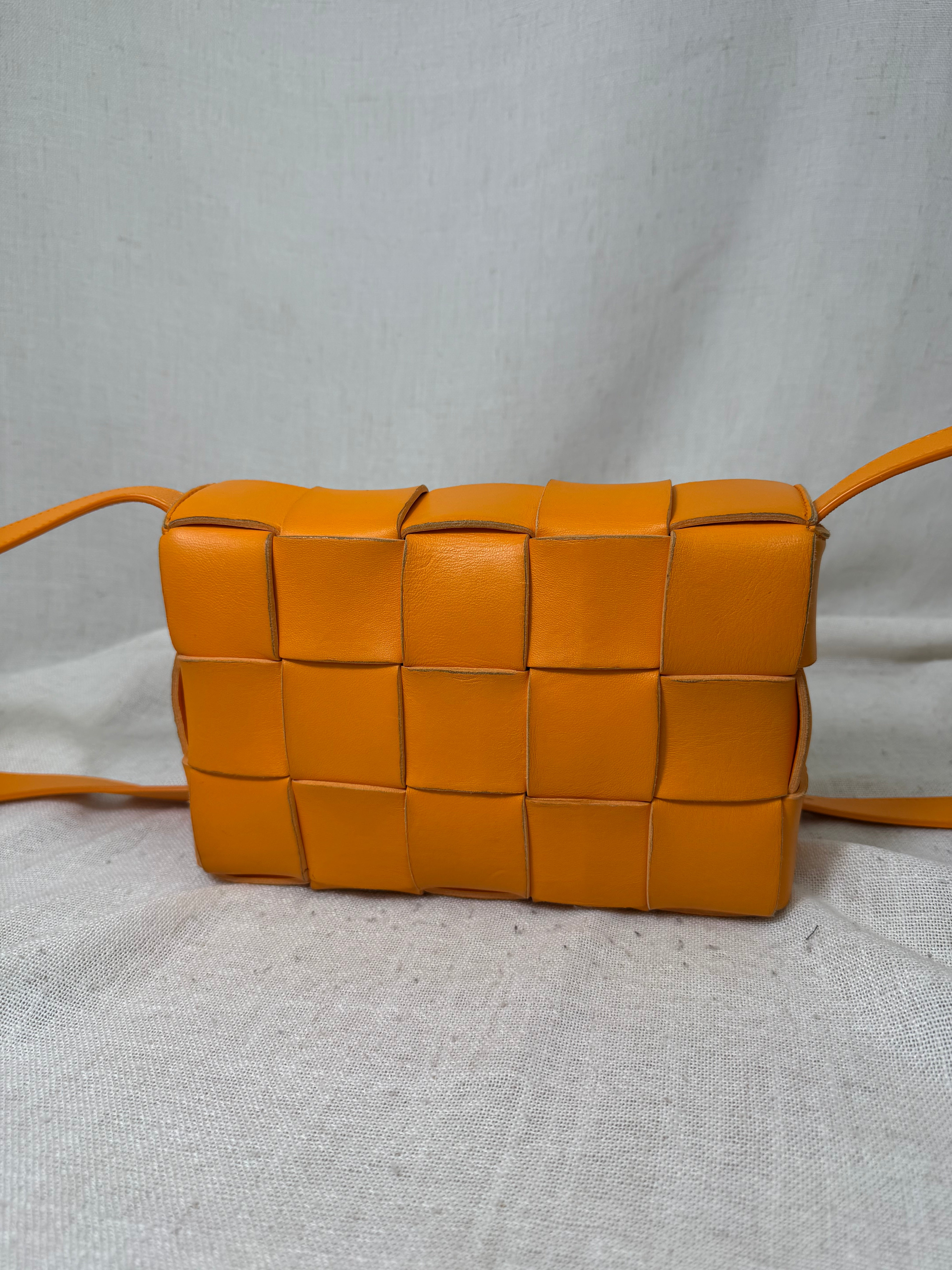 Bottega Veneta Orange Intrecciato Leather Cassette Crossbody Bag
