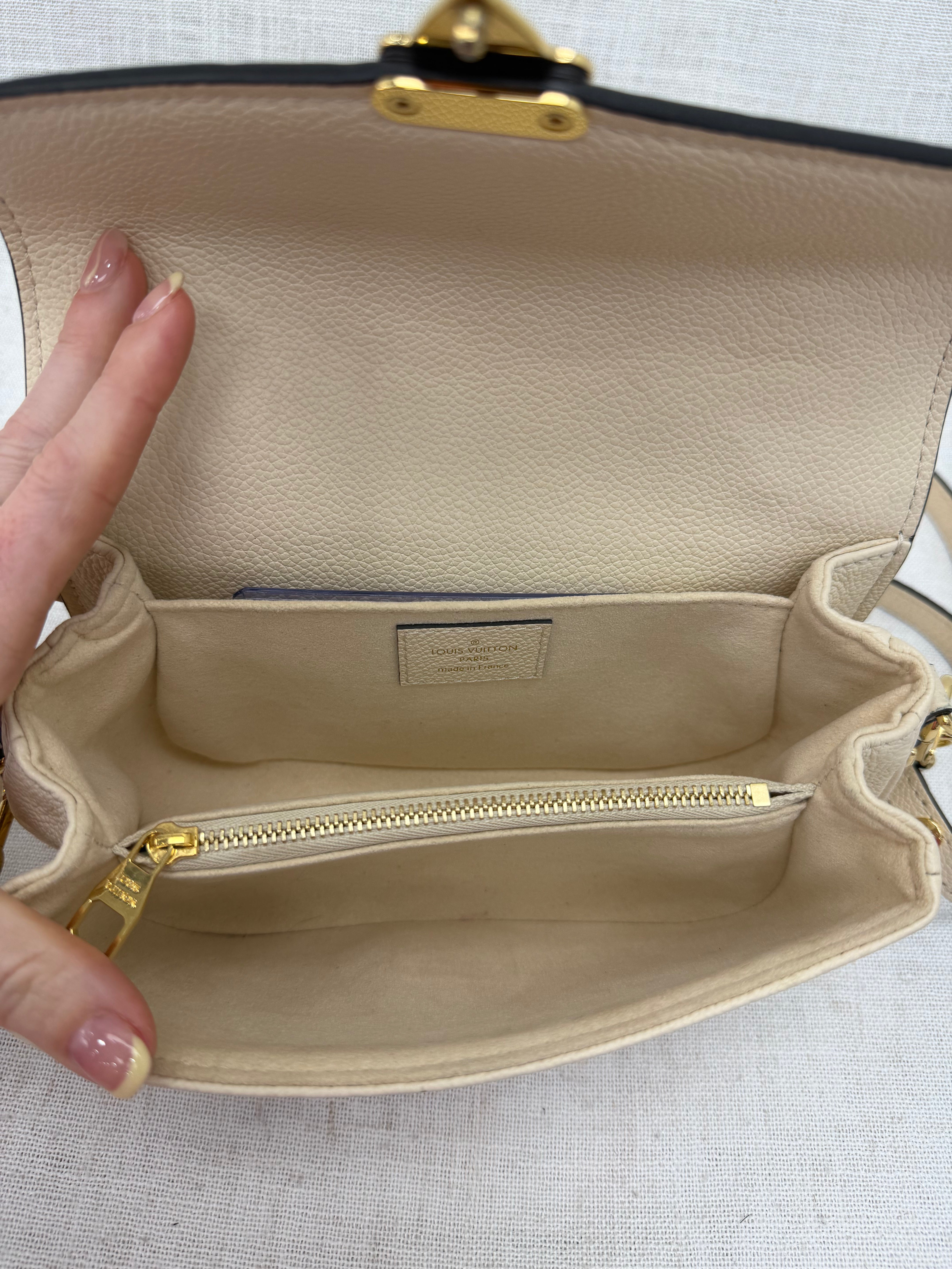 Louis Vuitton Cream Empreinte Leather East West Pochette Metis