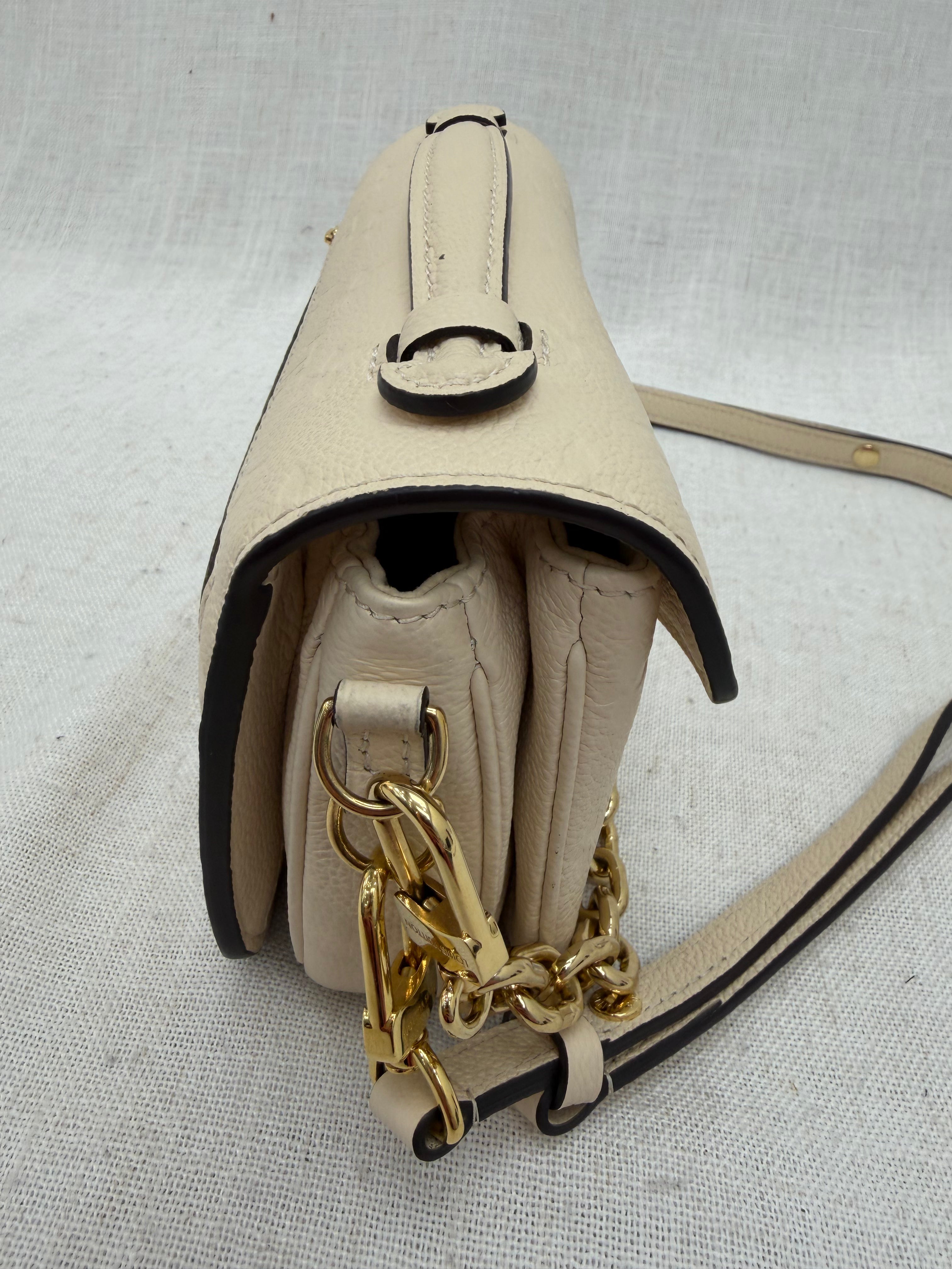 Louis Vuitton Cream Empreinte Leather East West Pochette Metis