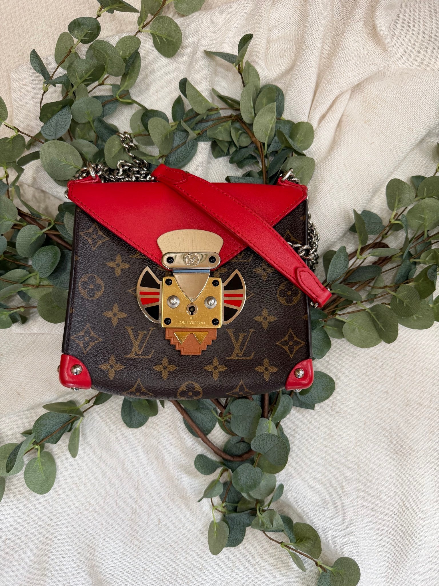 Louis Vuitton Rouge Limited Edition Tribal Mask Pochette Crossbody
