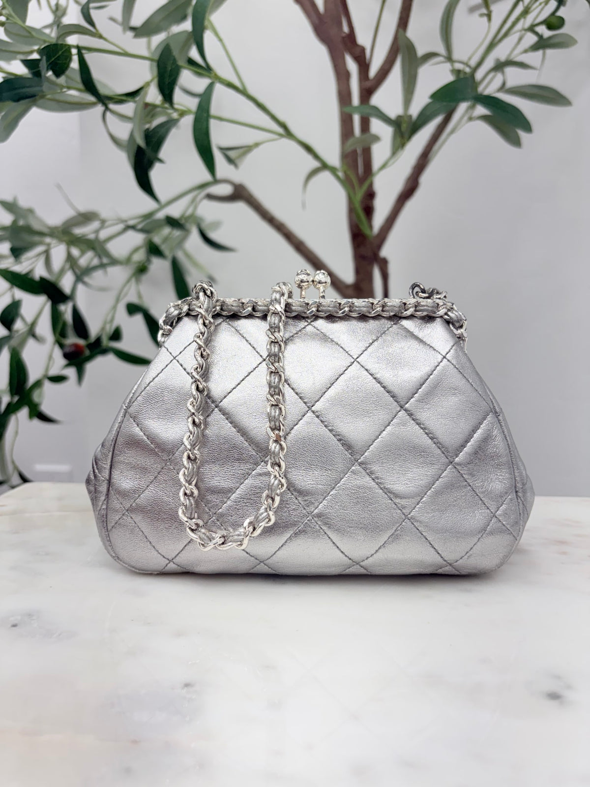 Chanel Metallic Silver Quilted Lambskin Kisslock Frame Bag