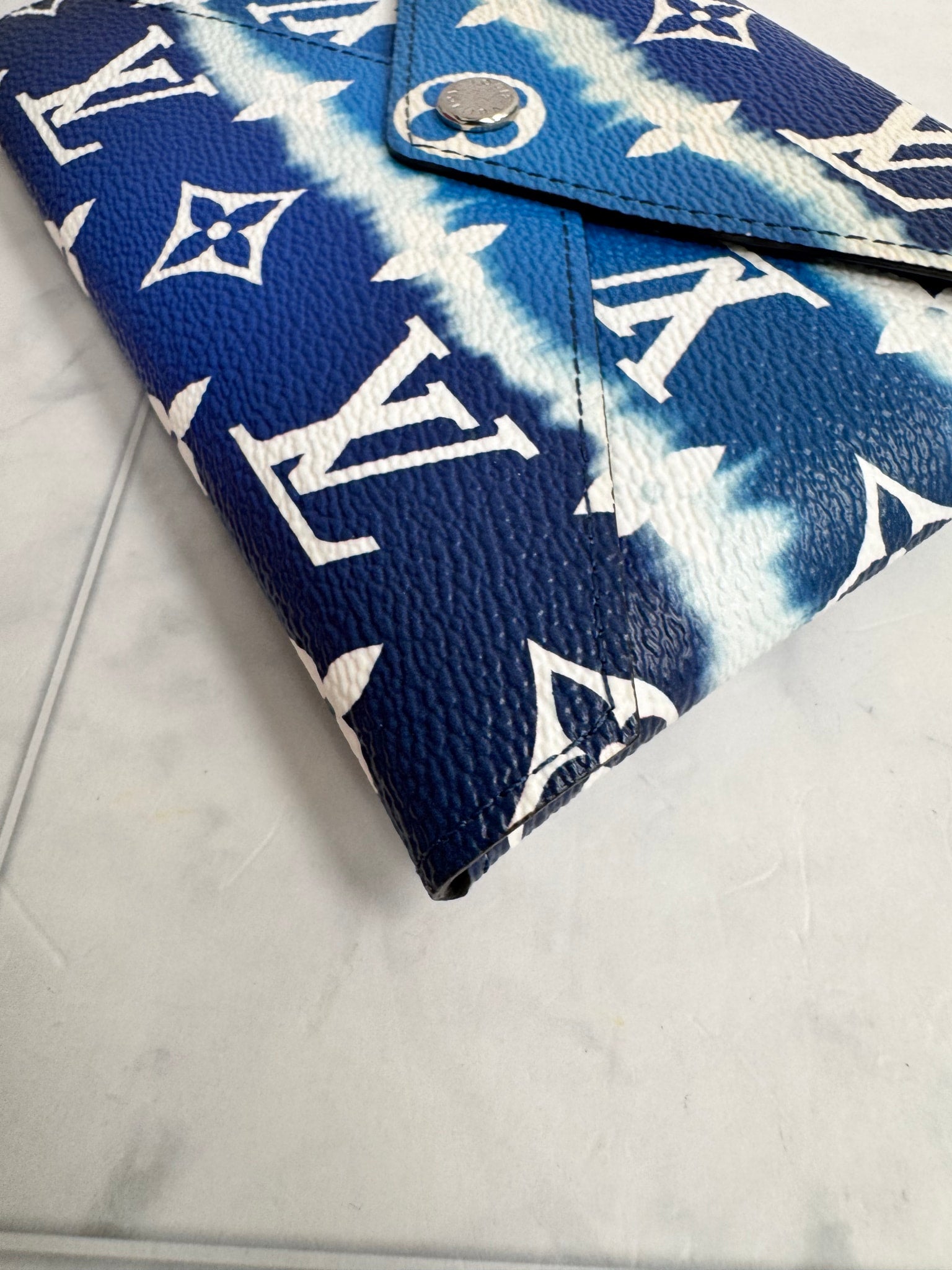 Louis Vuitton Blue Monogram Escale Medium Kirigami Pochette