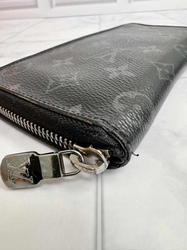 Louis Vuitton Monogram Eclipse Vertical Zippy Wallet