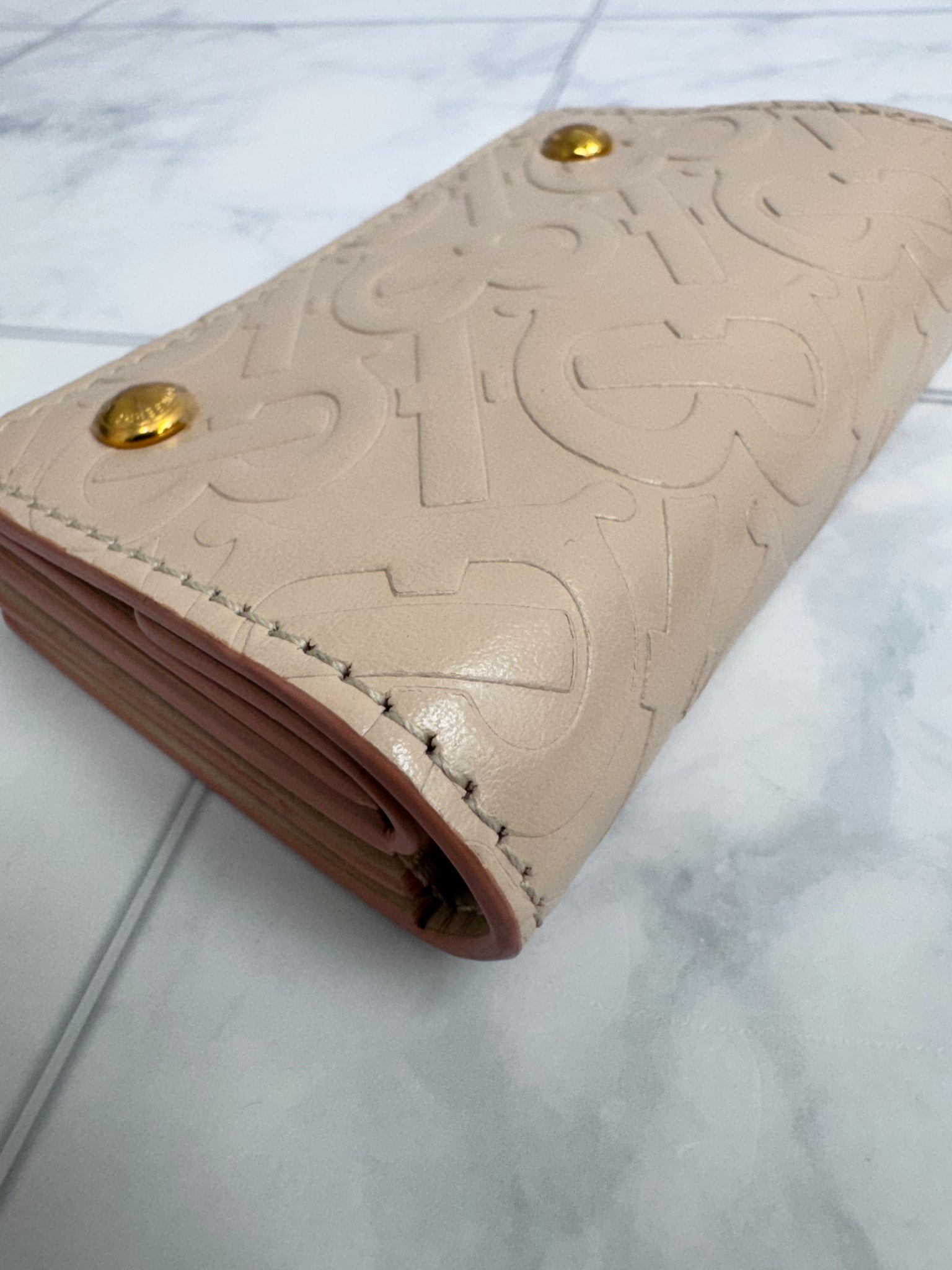 Burberry Pink Monogram Embossed Leather Compact Wallet