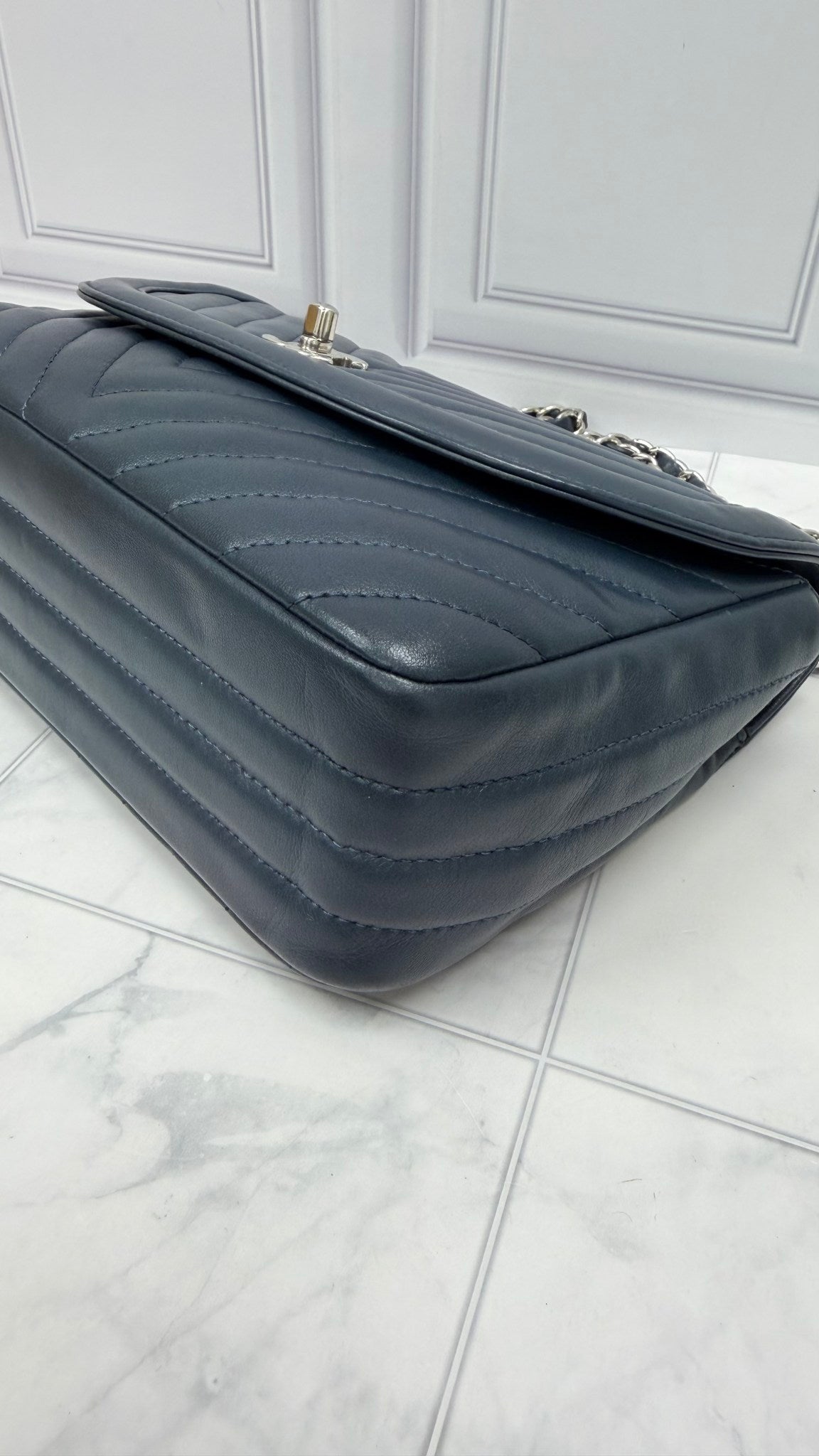 Chanel Navy Chevron Quilted Calfskin Round CC Flap Bag