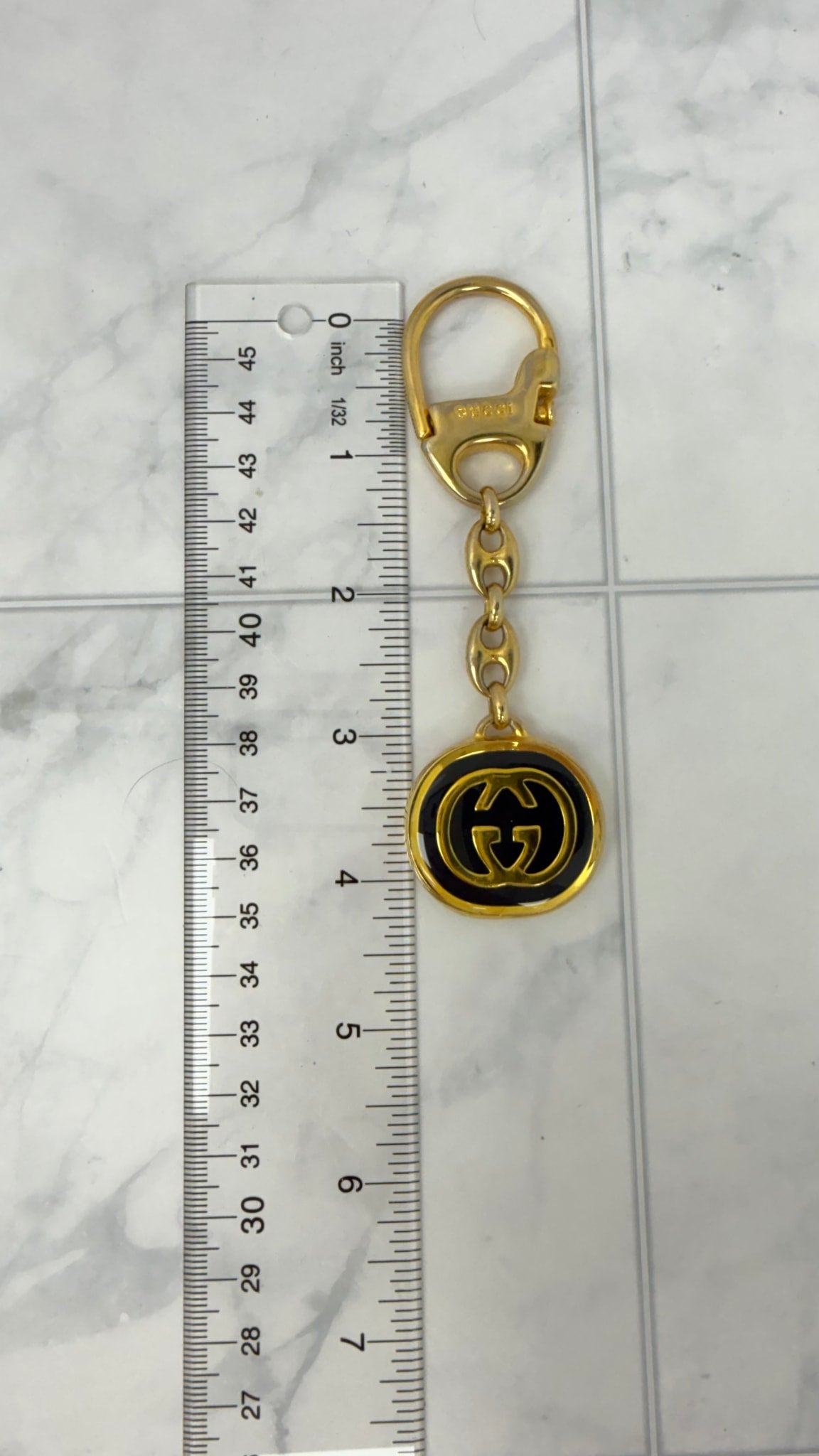 Gucci Gold Tone Enamel Interlocking G KeyChain