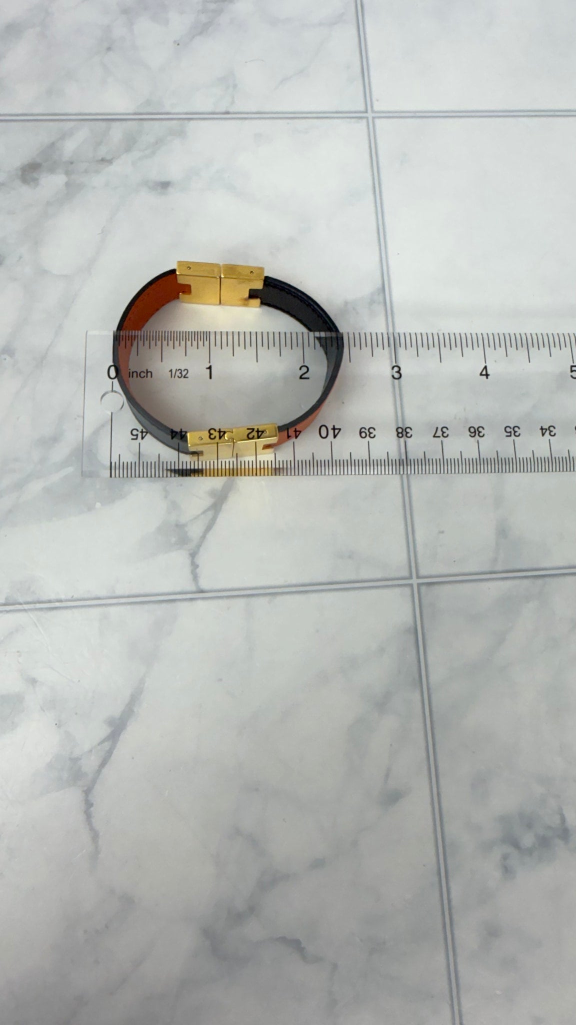 Hermes Black And Orange Leather Lurie Reversible Bracelet
