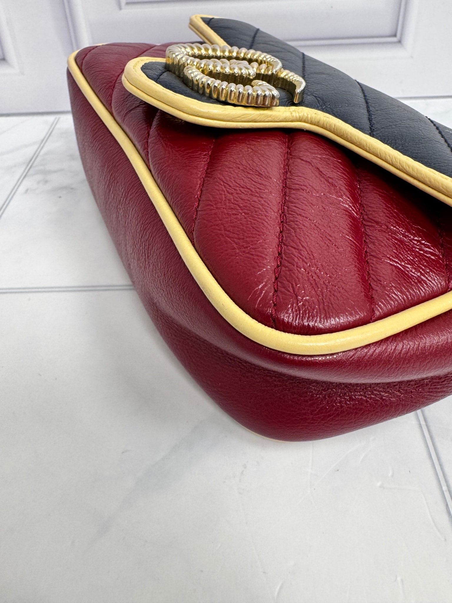 Gucci Red And Navy Quilted GG Marmont Torchon Super Mini Crossbody Bag