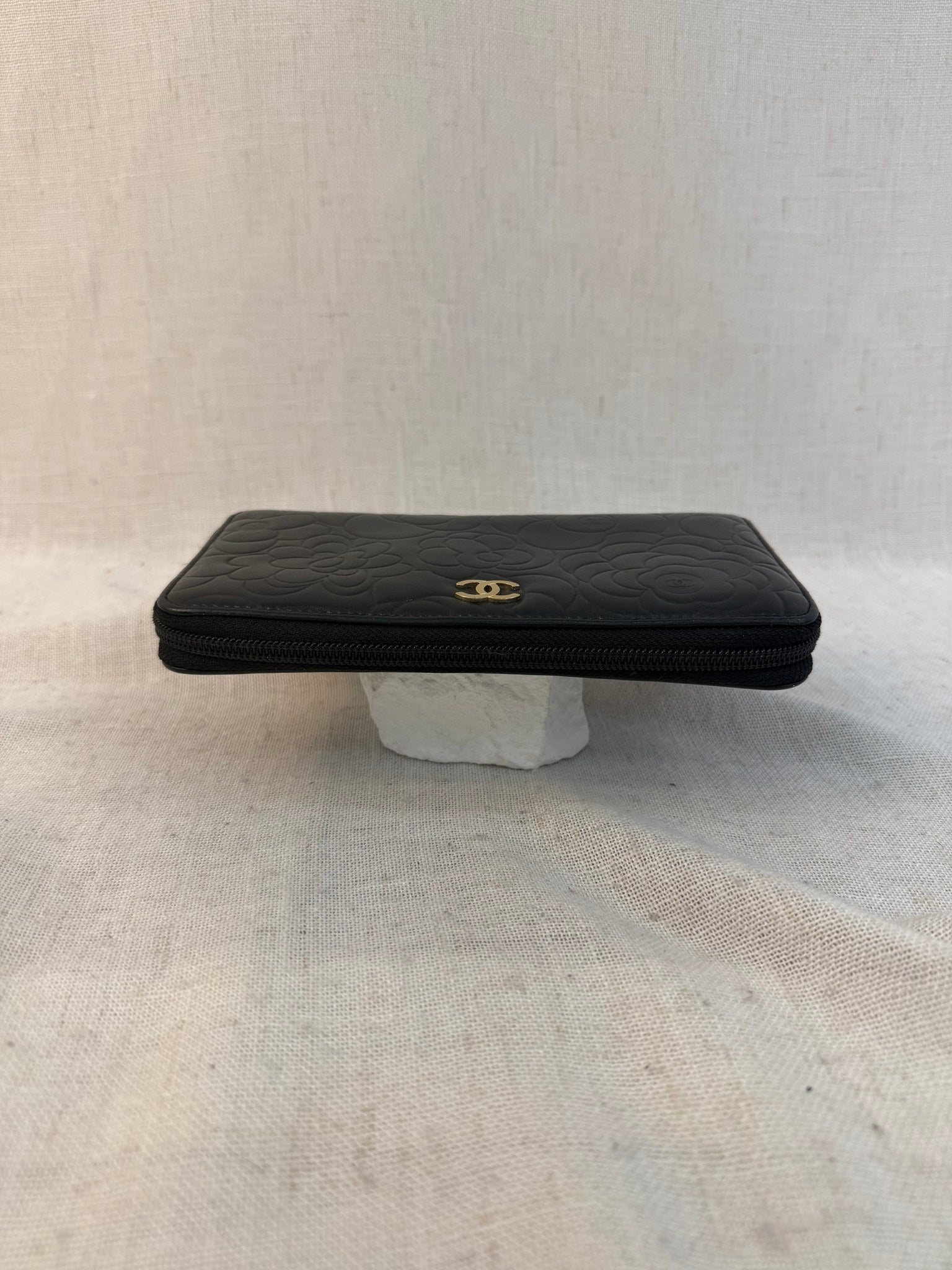 Chanel Black Lambskin Camellia Embossed Zippy Wallet