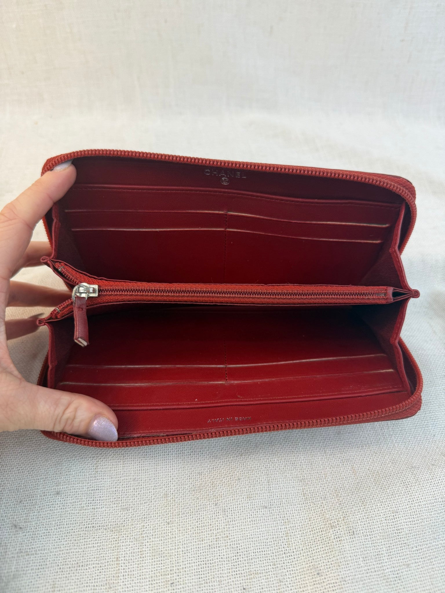 Chanel Red Lambskin Camellia Embossed Zippy Wallet