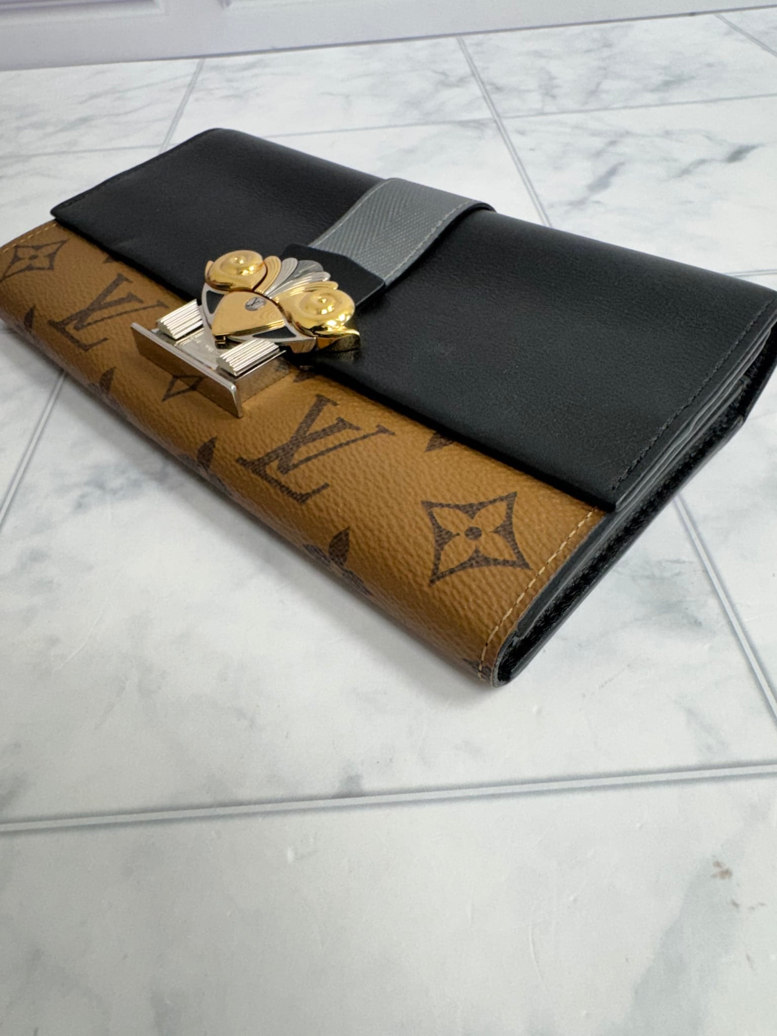 Louis Vuitton Reverse Monogram Column Clutch