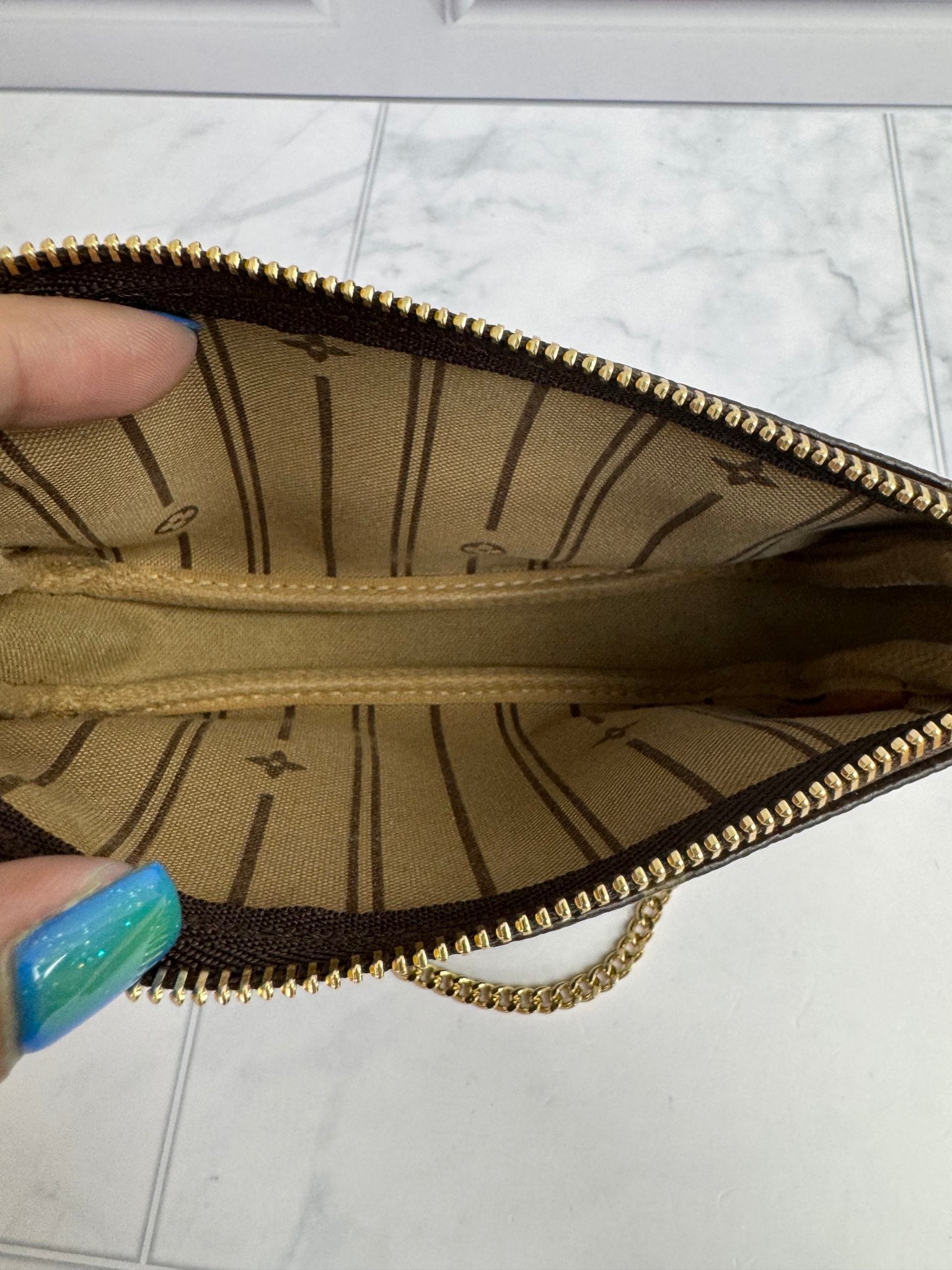 Louis Vuitton Monogram Limited Edition “Trunks & Bags” Mini Pochette
