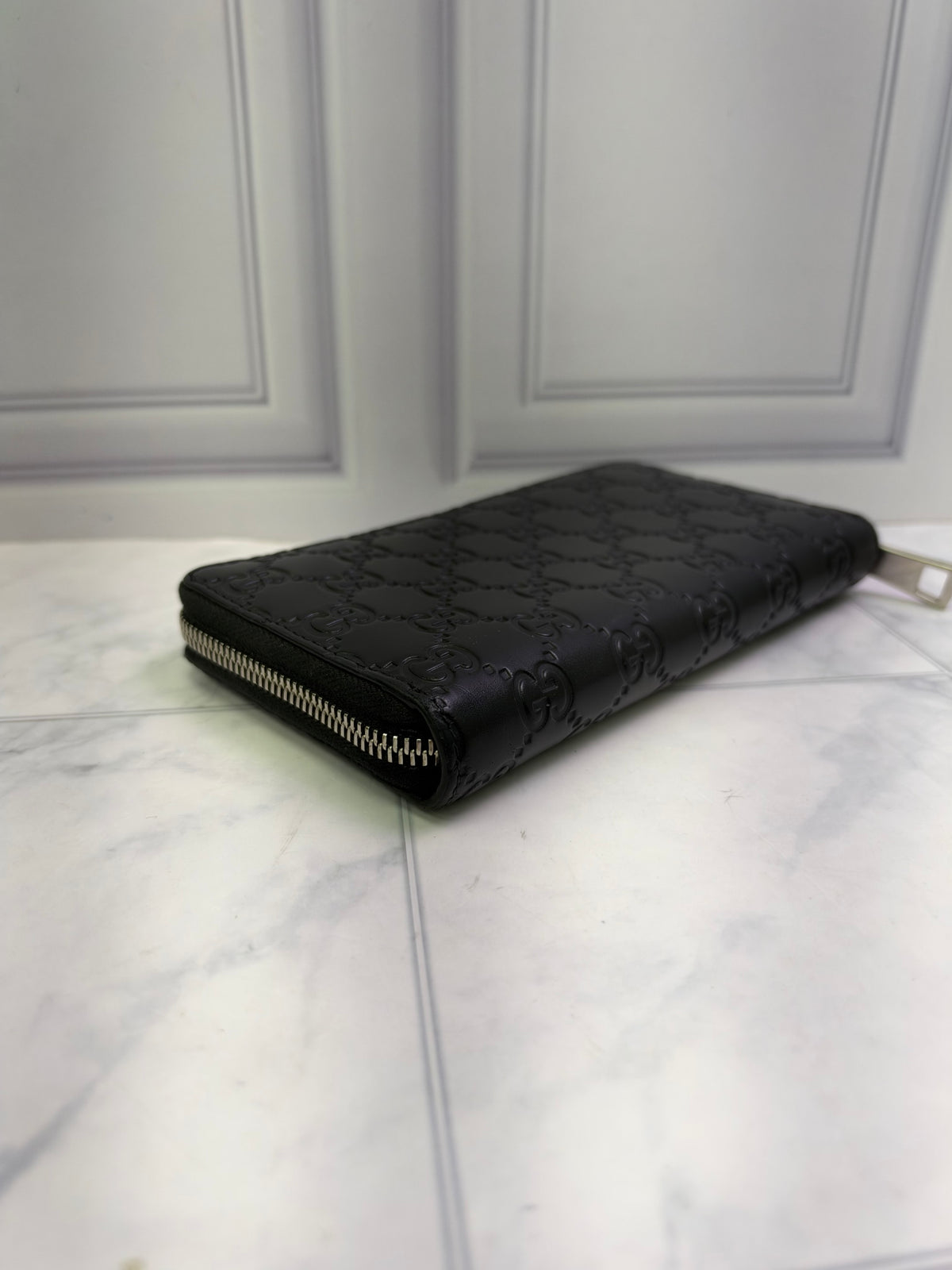 Gucci Black GG Leather Zippy Wallet