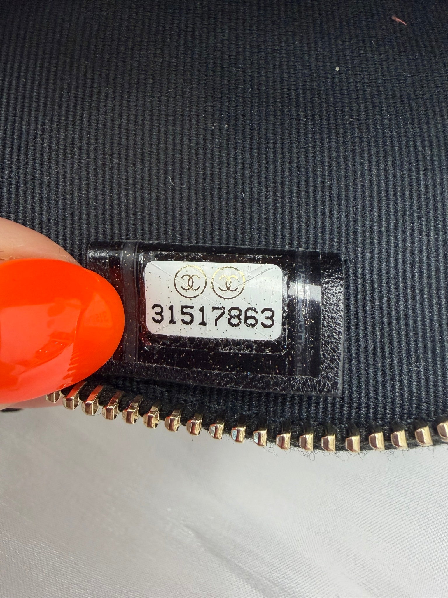 LIKE NEW- Chanel Black Lambskin Round Camellia Clutch on a Chain