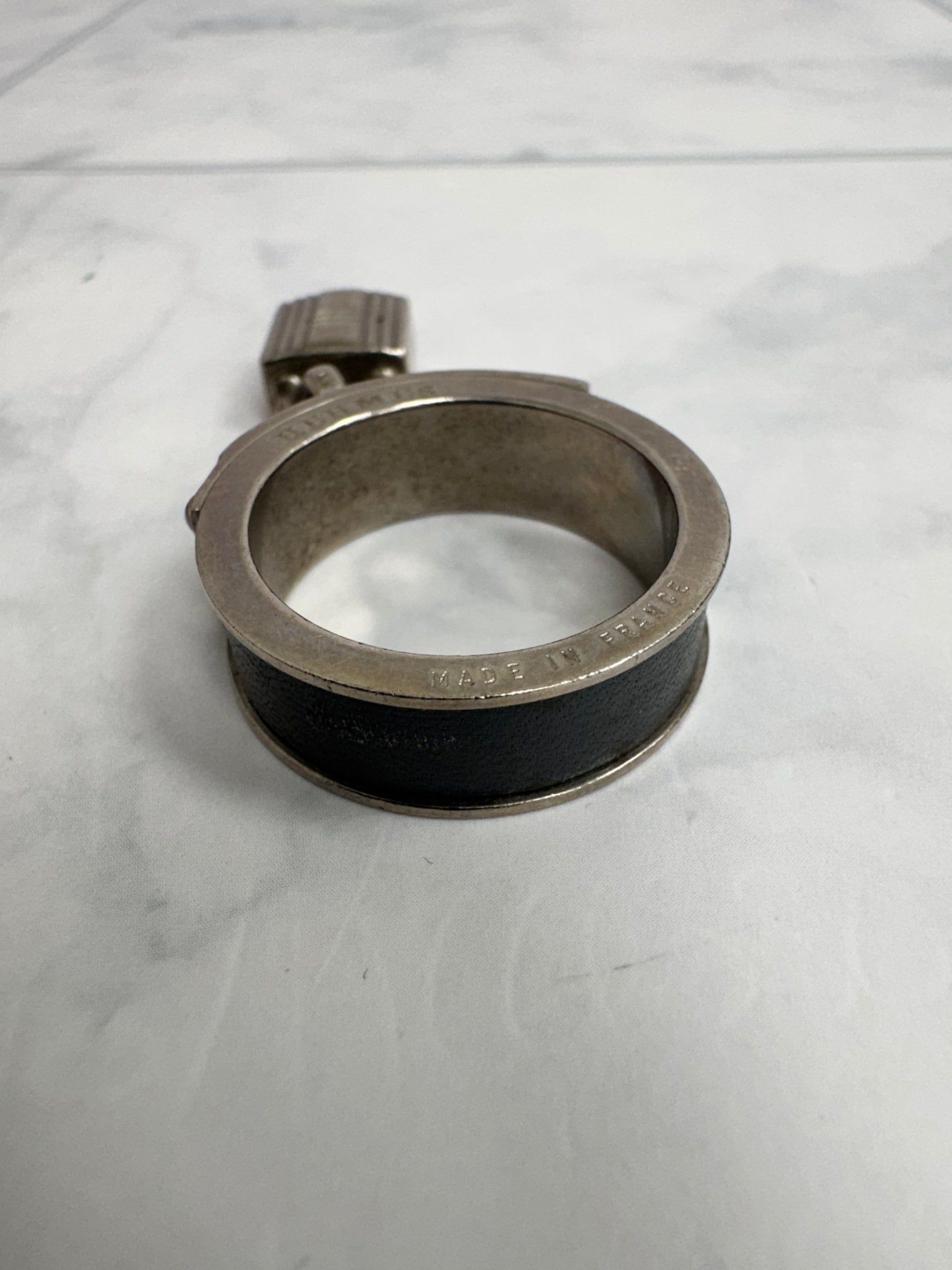 Hermes Silver Tone And Black Kelly Cadena Scarf Ring