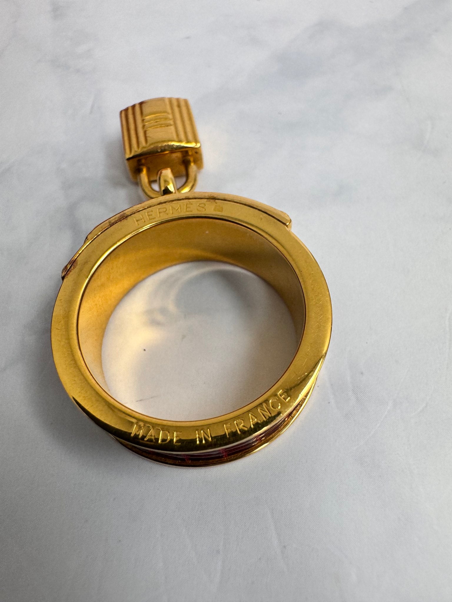 Hermes Gold And Burgundy Kelly Scarf Ring