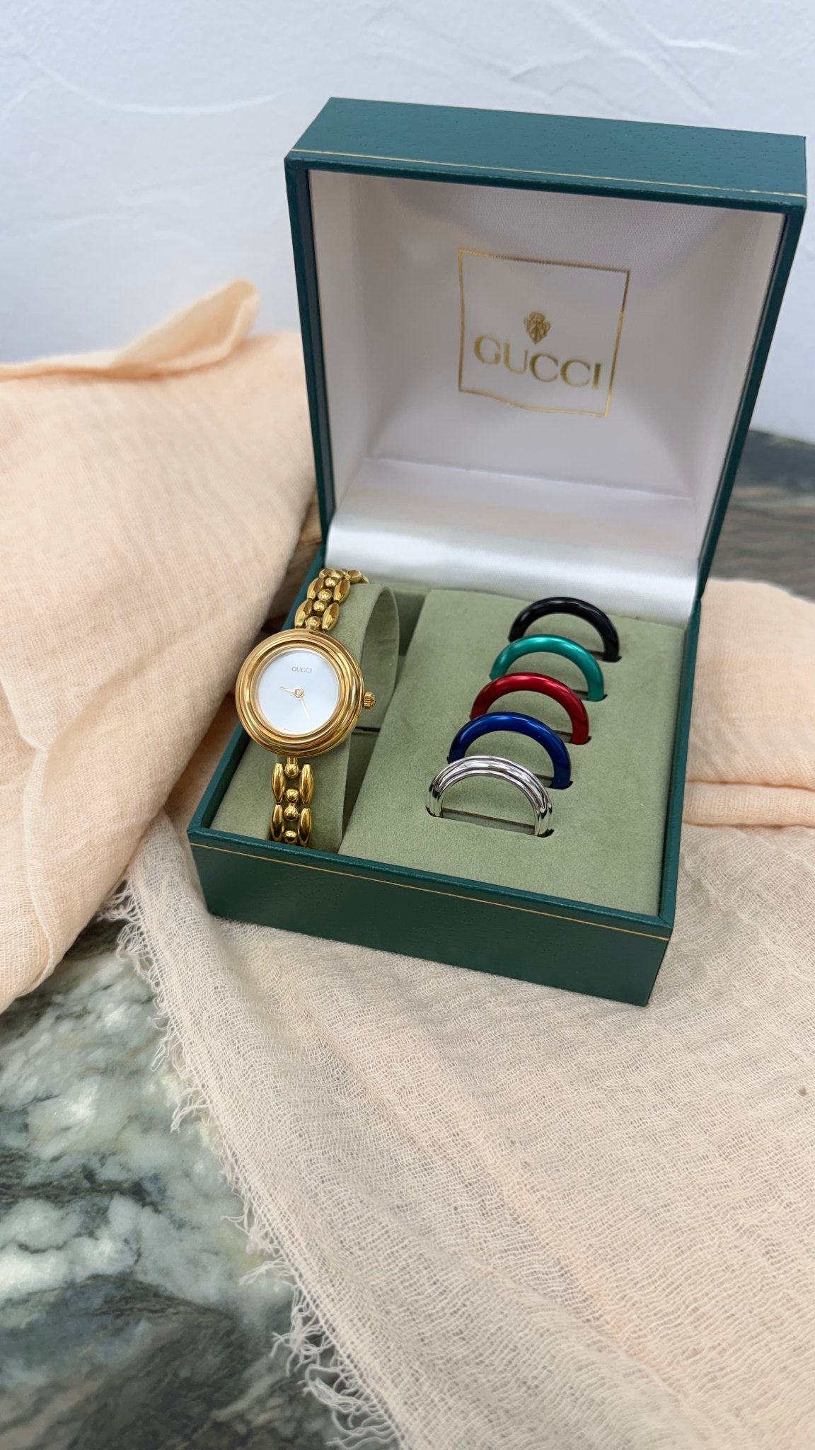 Gucci Gold Toned Interchangeable Bezel Watch With Extra Bezels 26MM