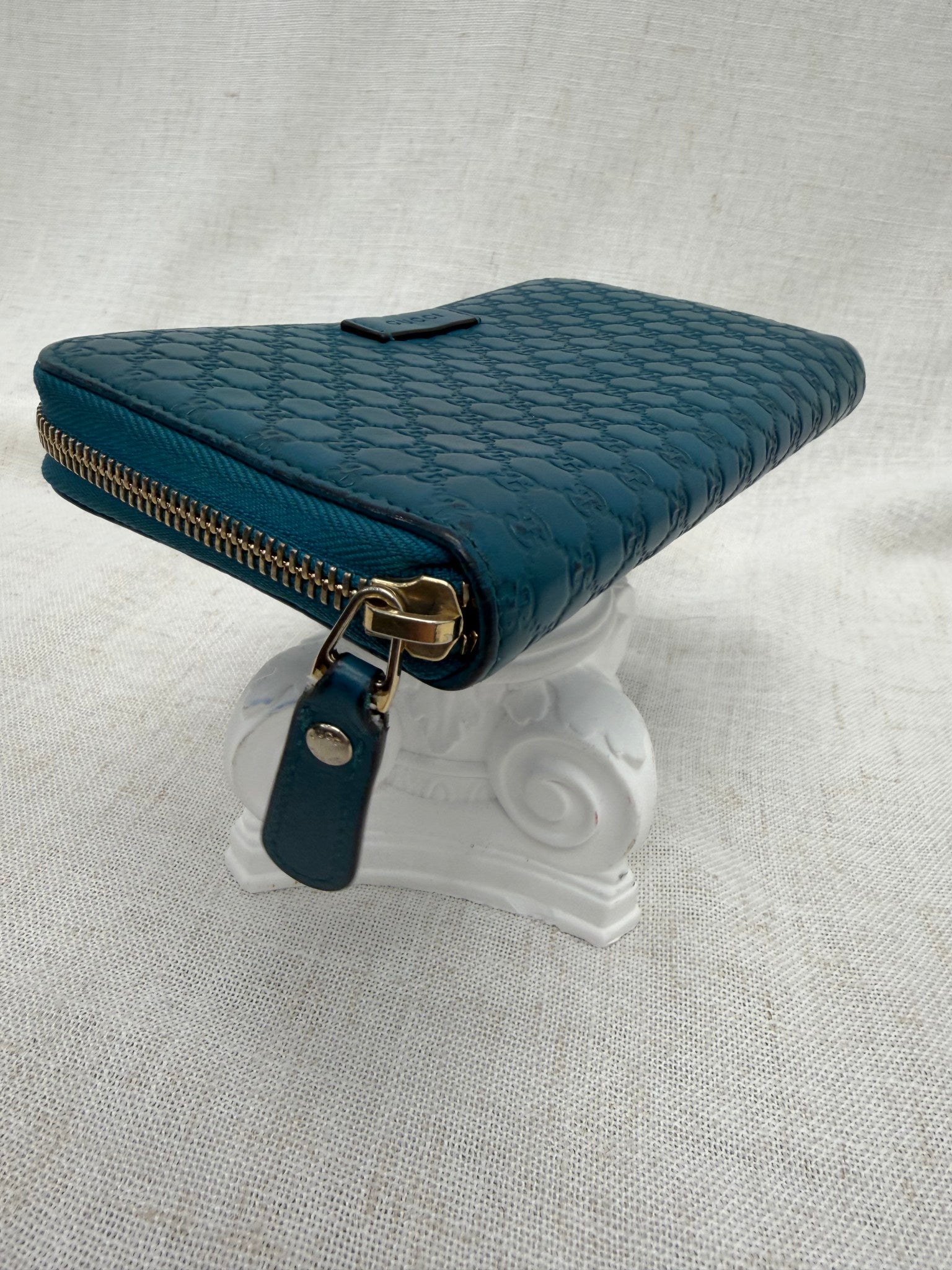 Gucci Teal Guccissima Leather Zippy Leather