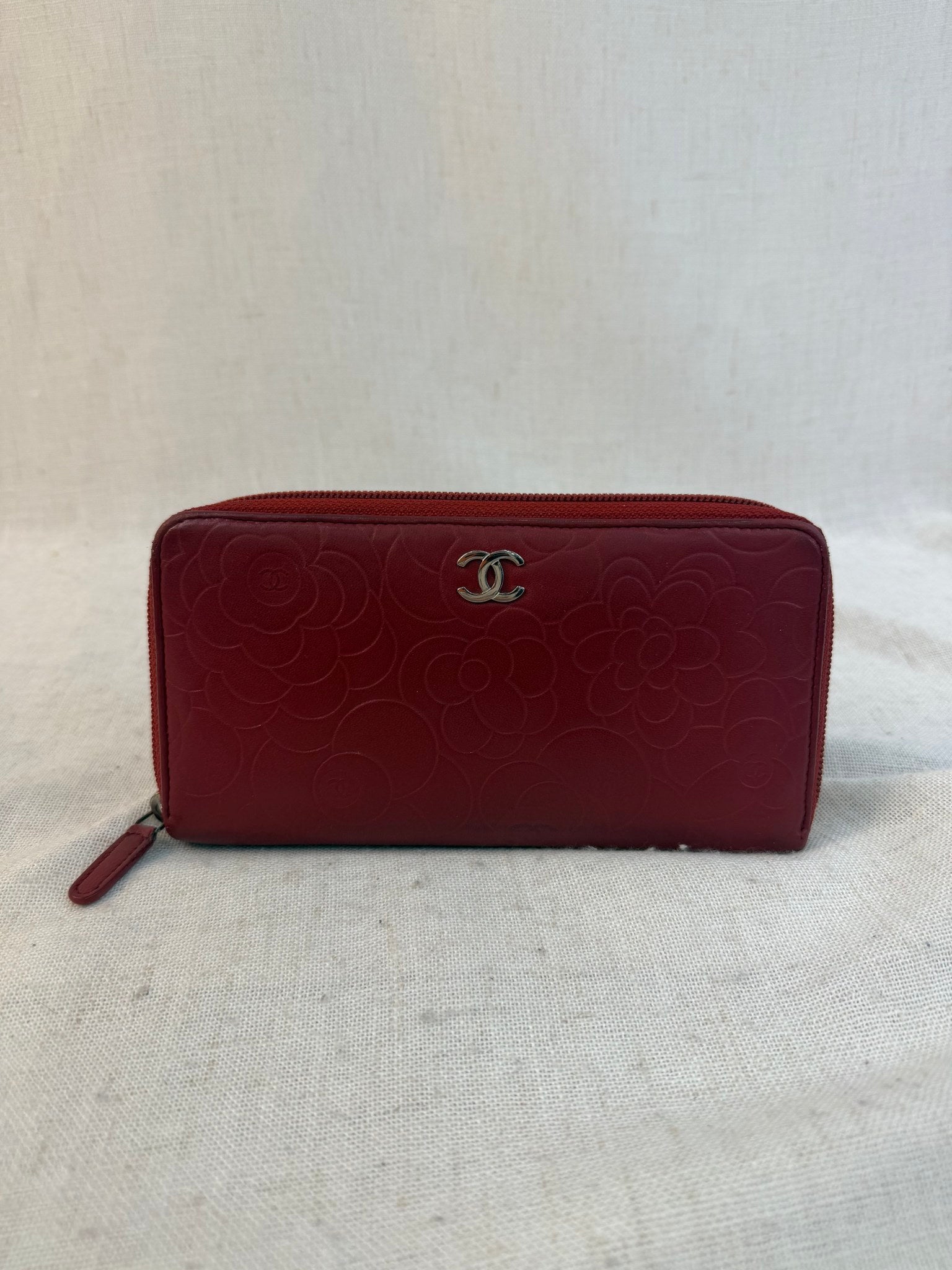 Chanel Red Lambskin Camellia Embossed Zippy Wallet