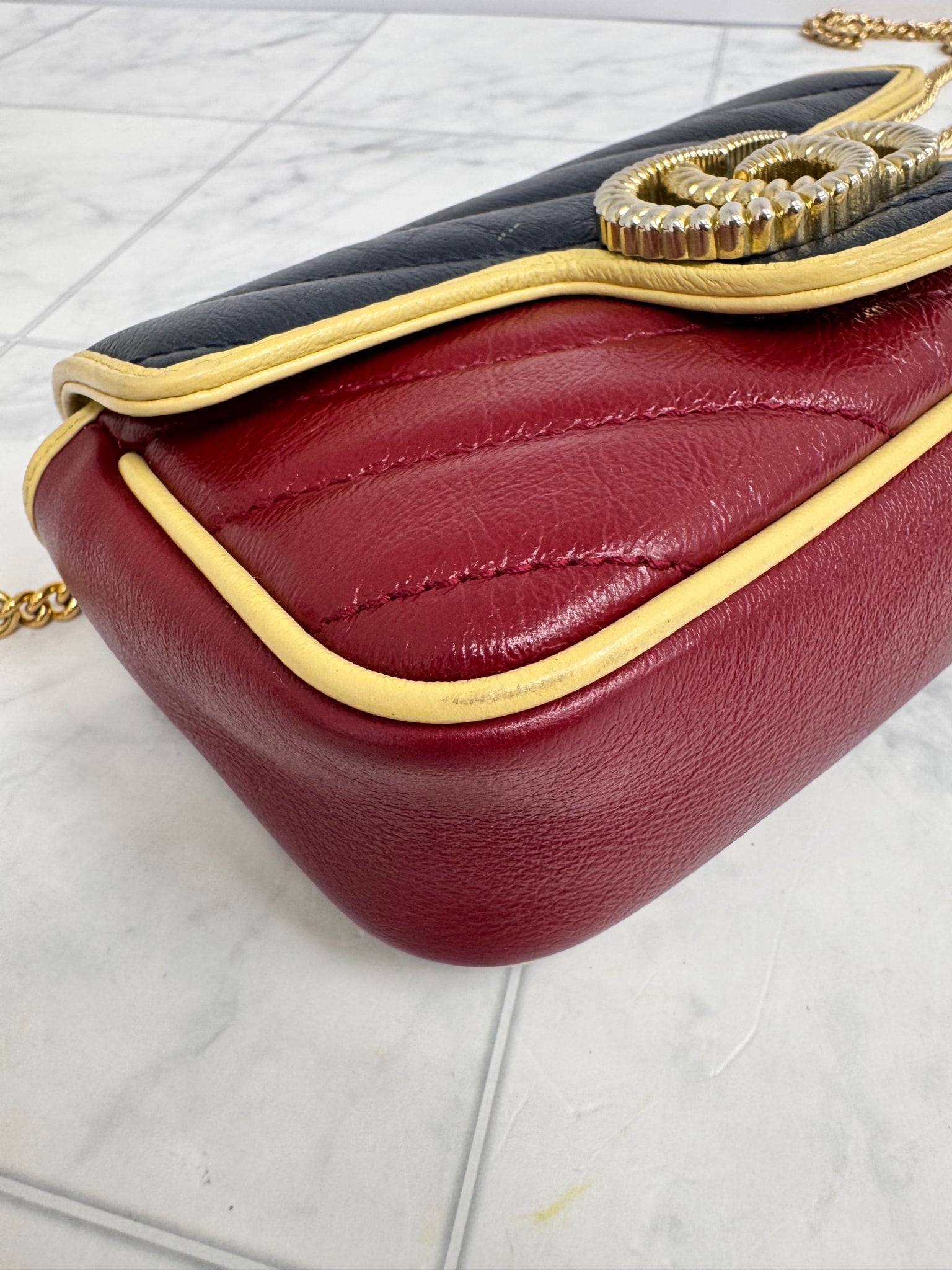 Gucci Red And Navy Quilted GG Marmont Torchon Super Mini Crossbody Bag