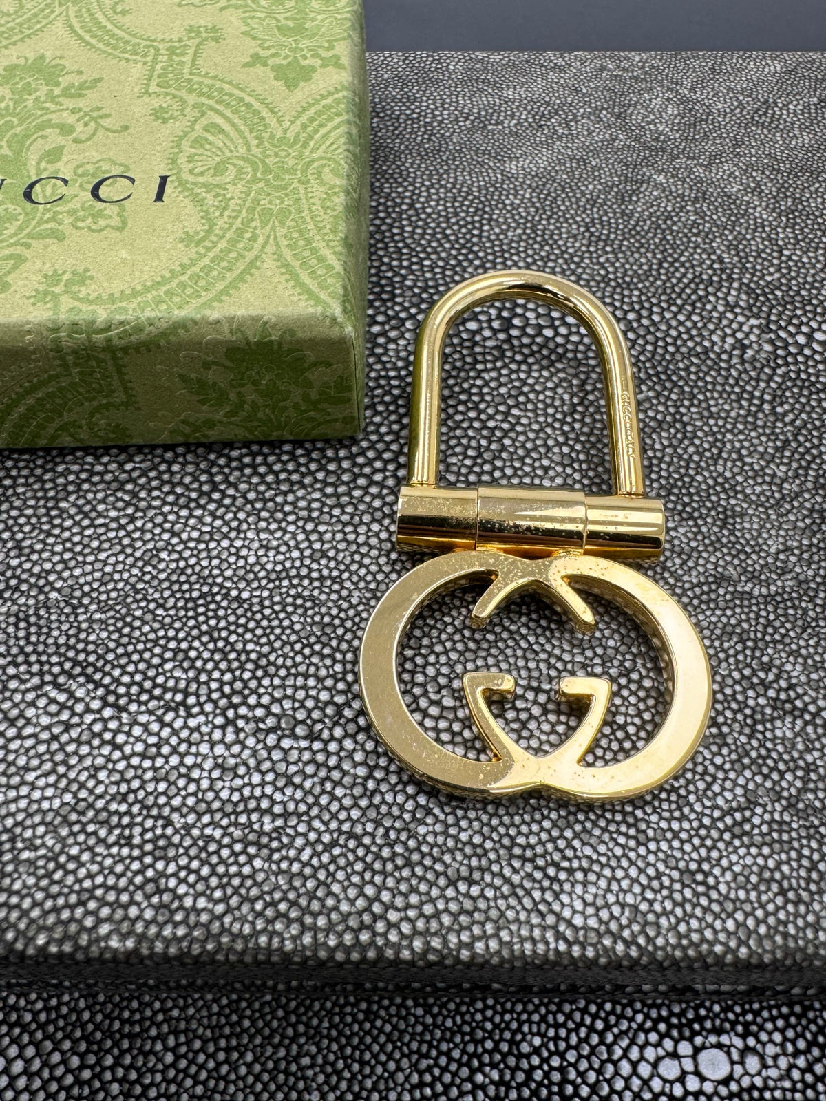 Gucci Gold Tone Interlocking G Keychain