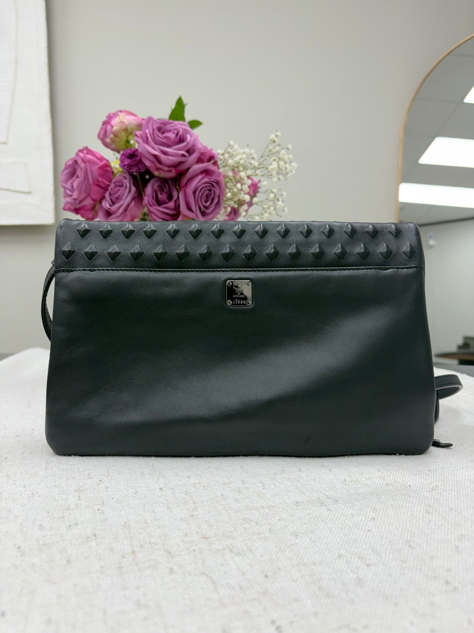 MCM Black Studded Embossed Leather Foldover Crossbody Bag