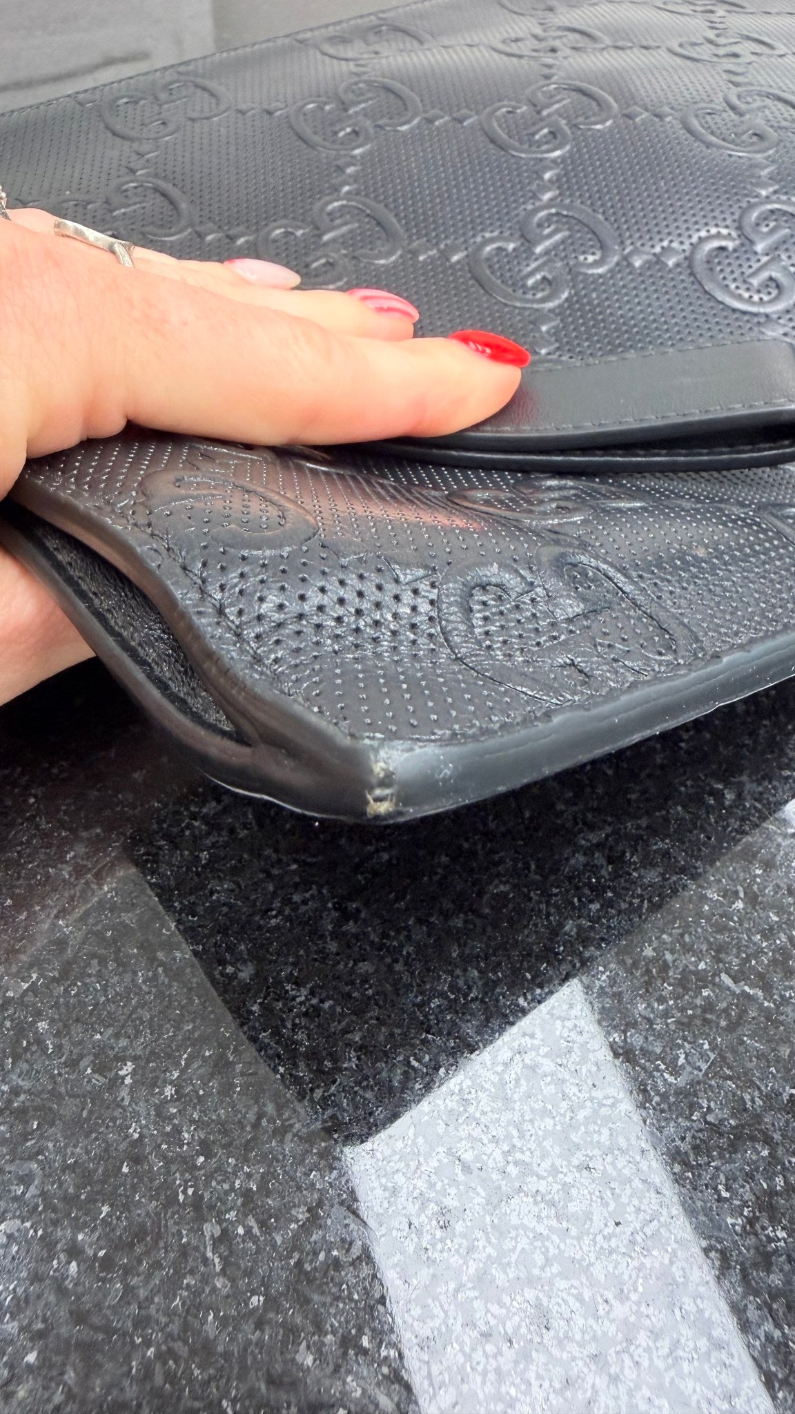 Gucci GG Embossed Perforated Leather Wristlet