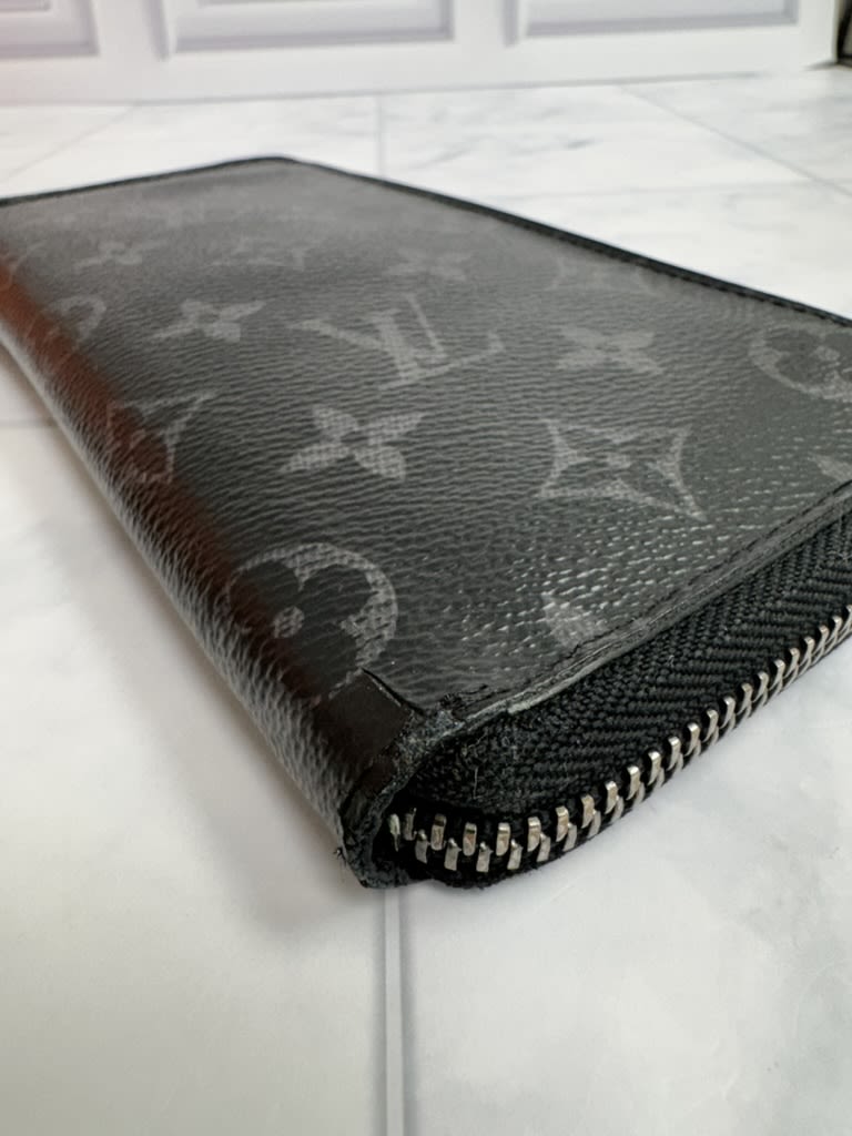 Louis Vuitton Monogram Eclipse Vertical Zippy Wallet