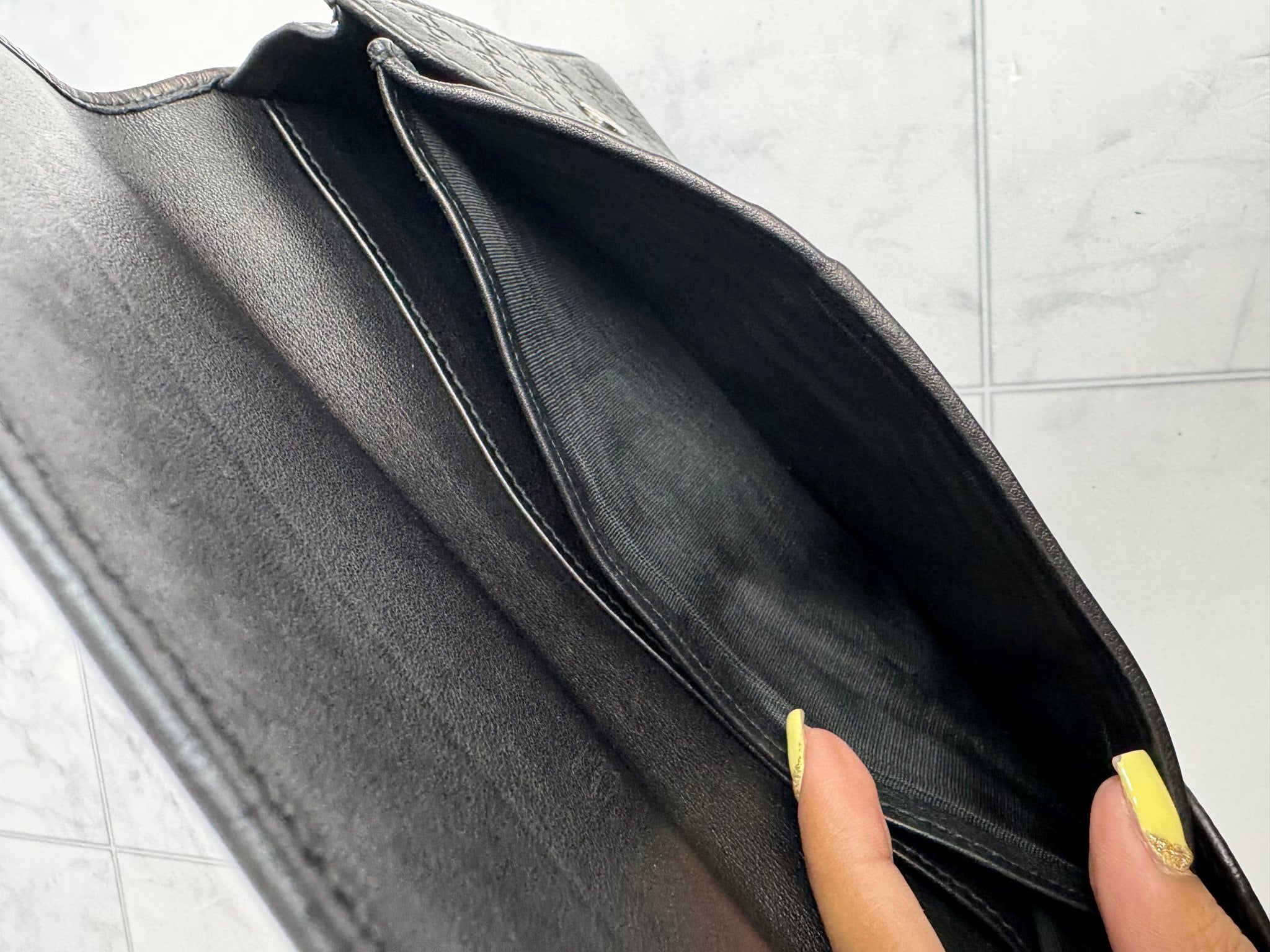 Gucci Black Microguccissima Embossed Leather Wristlet